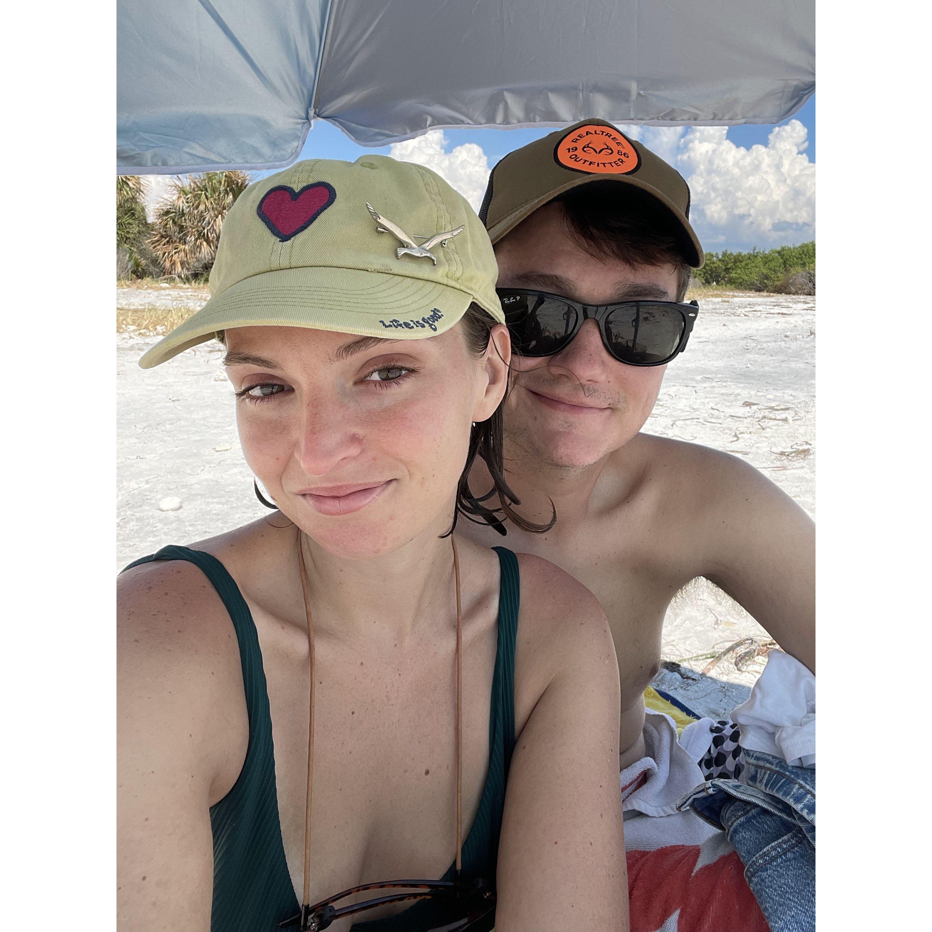 Sittin in the shade at Honeymoon.. Can you tell we like the beach?