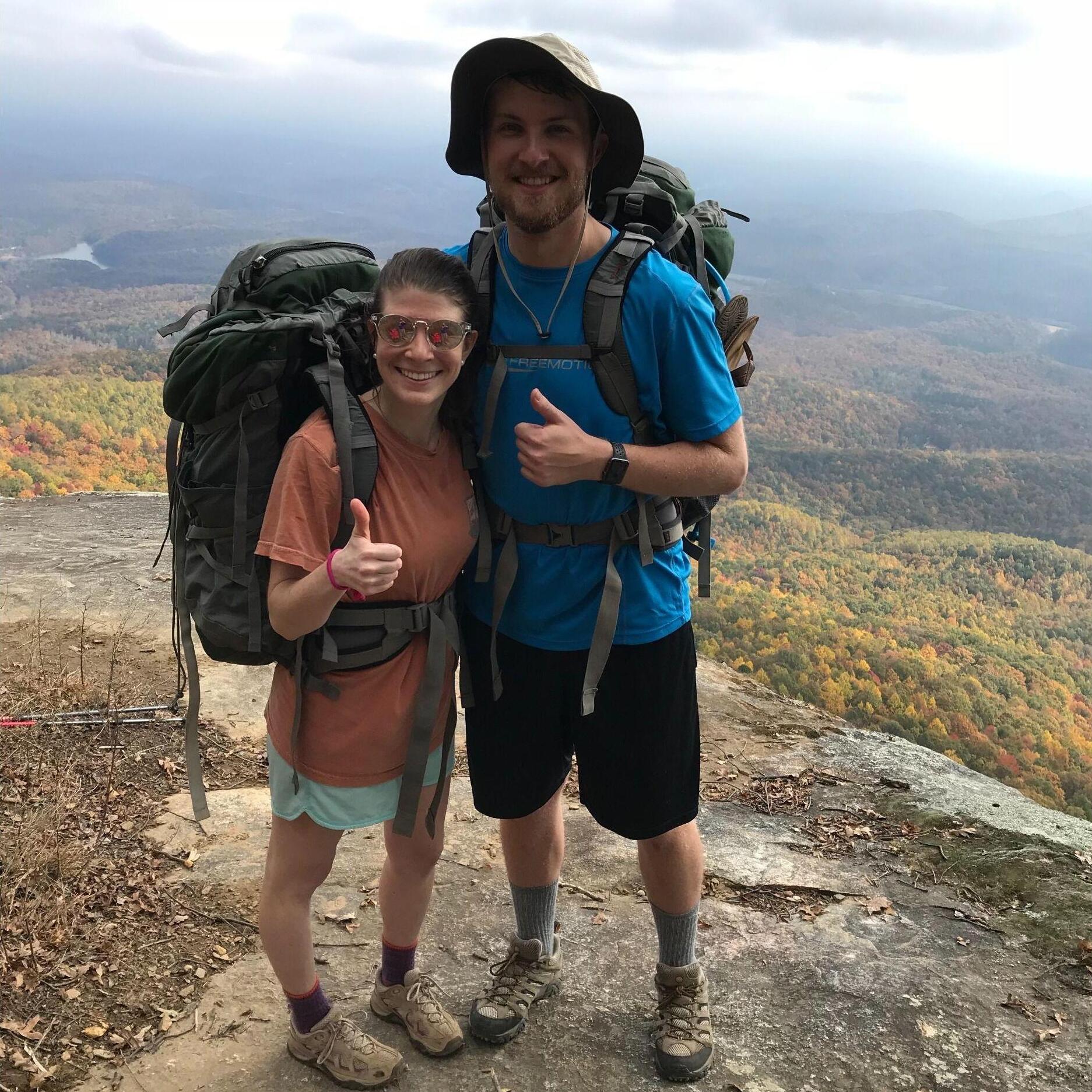 Our love for the outdoors and each other continued to flourish. We were lucky enough to go backpacking with Luke's Uncle Pat in the SC Foothills. Here we are at Sassafras Mtn, the highest point in SC.