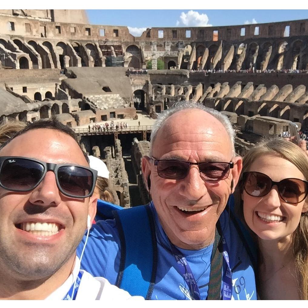 big smiles!! at The Colosseum in Rome