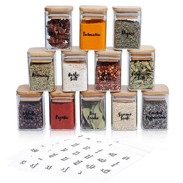 Elevated Habitat 12 eco-friendly Spice Jars Glass with airtight silicone seals, bamboo lids and 130 pre printed spice labels. Storage containers perfect for seasoning, spices, herbs & grains.