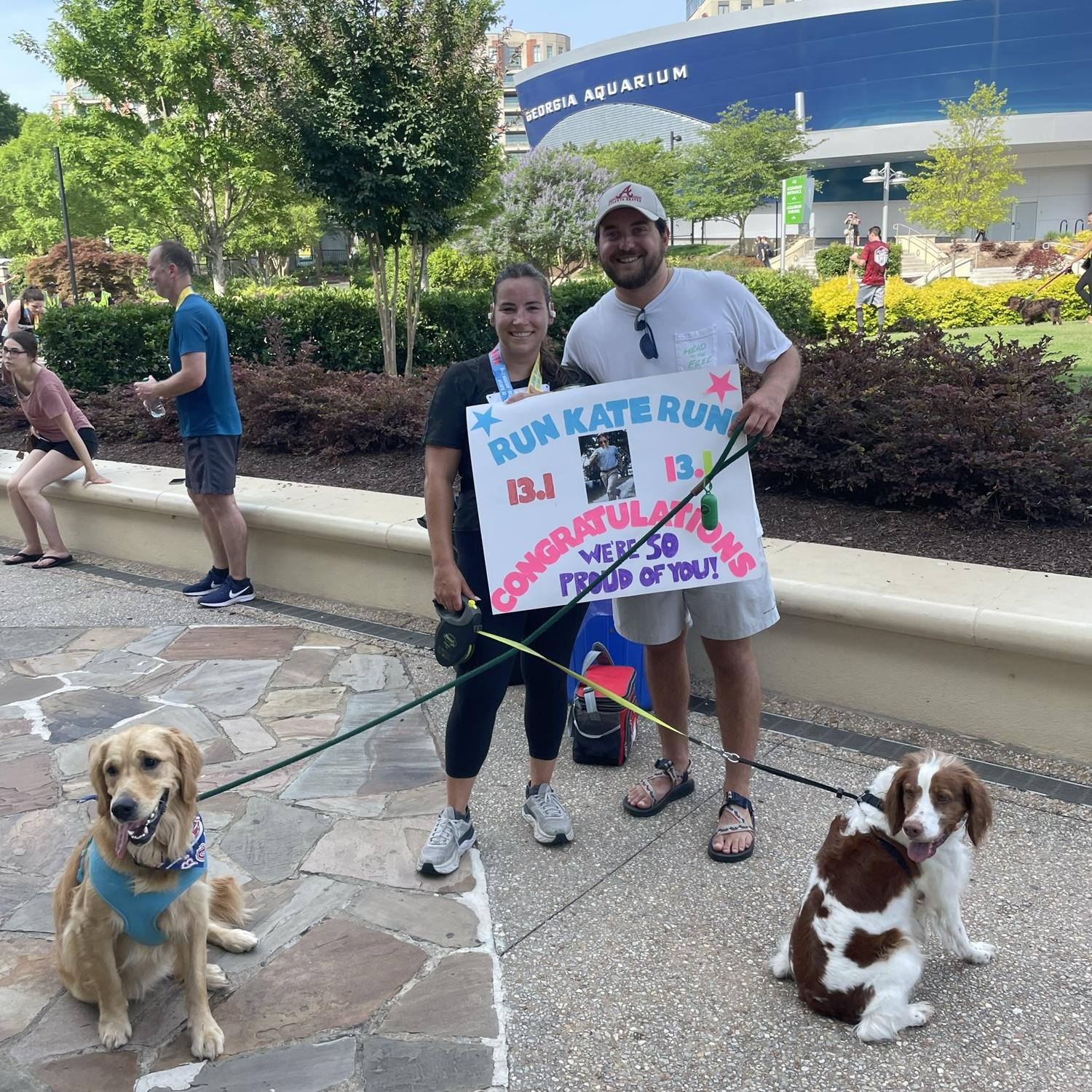 Chaos trying to get a picture with the dogs after the half marathon lol
