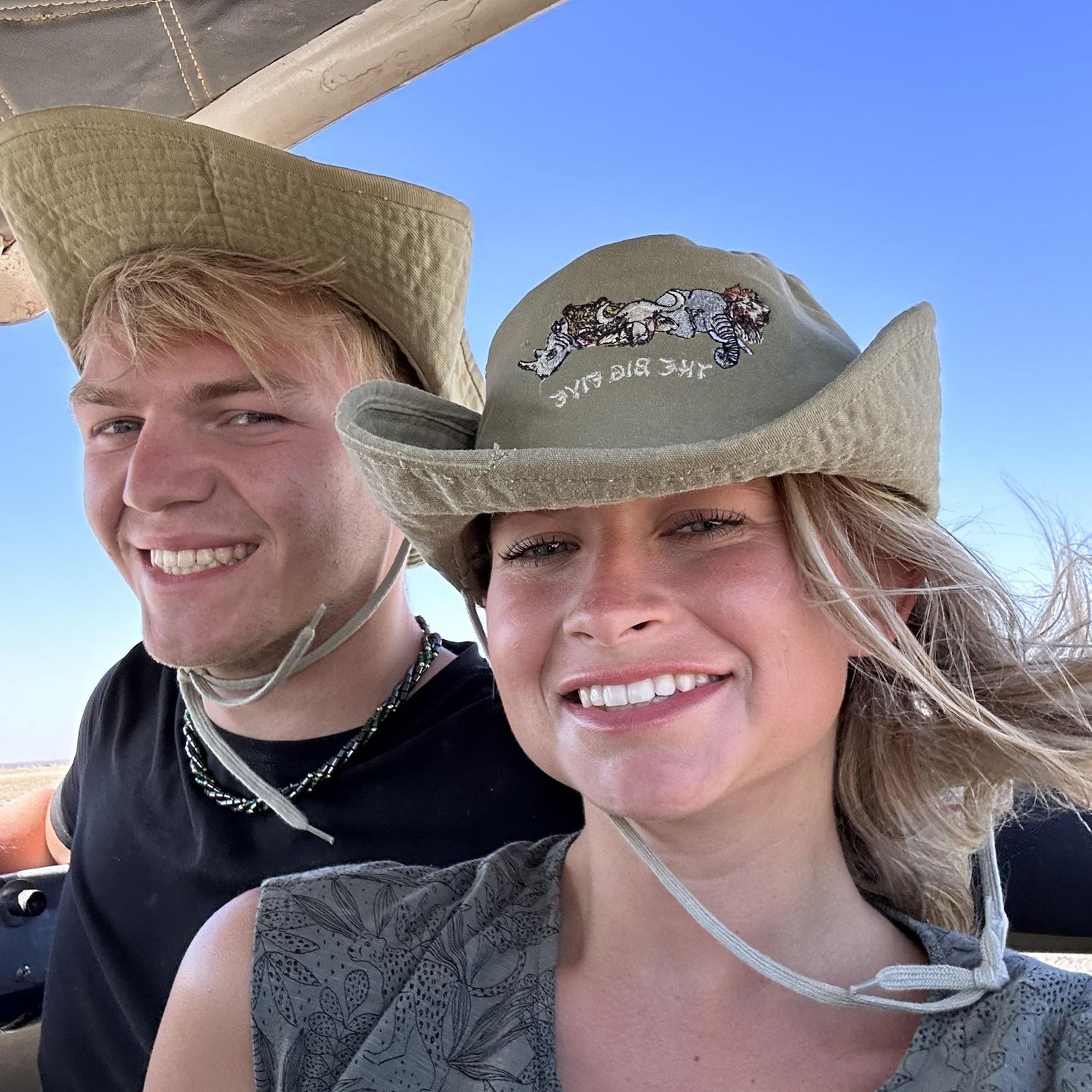 Iconic selfie of us on our safari jeep. We dream of coming back here.