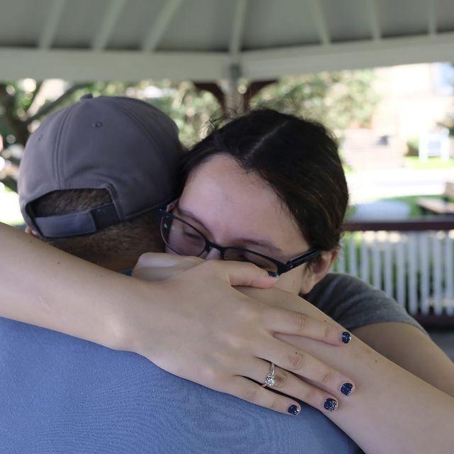 He "popped" the question! She said "Yes"
