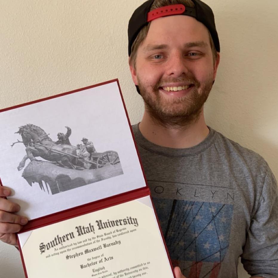 Max graduating with a BA of English!