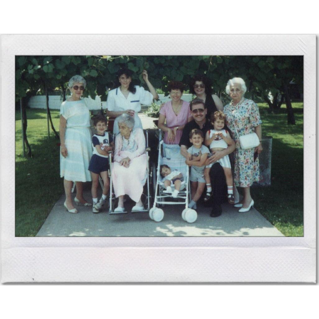 (back row) Nanny, Aunt Annie, Mom, Aunt Barbara, Tigsy
(front row) Tom, Aunt Emma, Chris, Mike,  Mark