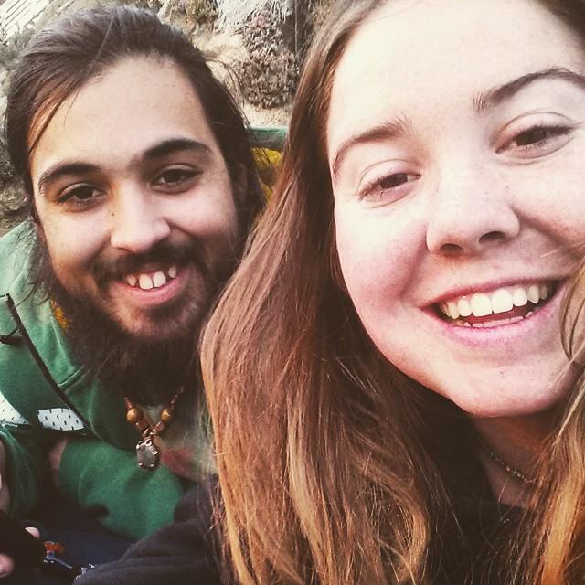 Us way back in 2015, enjoying the beach sand and sunset