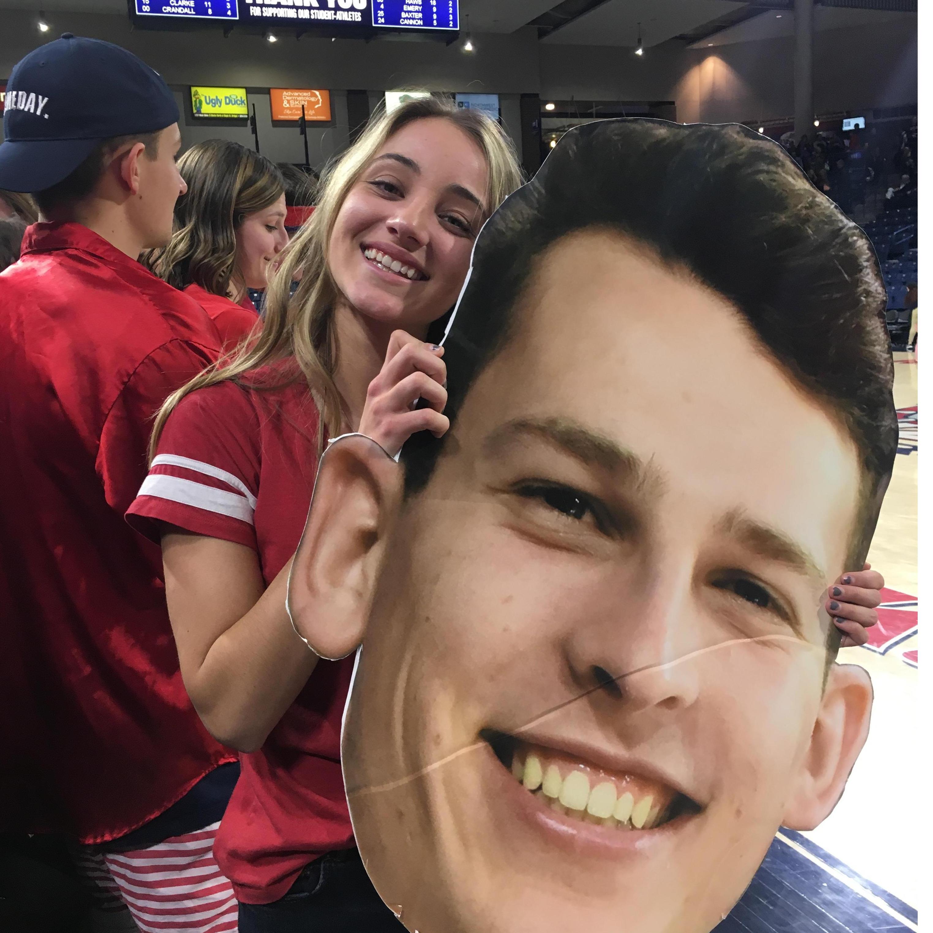 GU basketball Senior Night! Serena got to sit front row during the game and hold a picture of Joel!