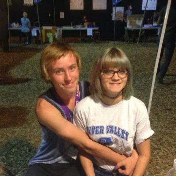 This is the first photo that we ever took together as a couple. Both of hair choices are the highlight of this photo.