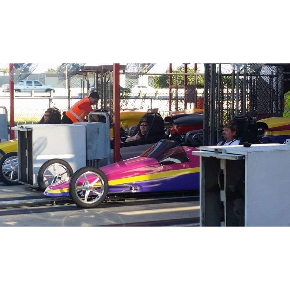 Chris and Uncle Brian about to burn rubber in Dallas Speedway