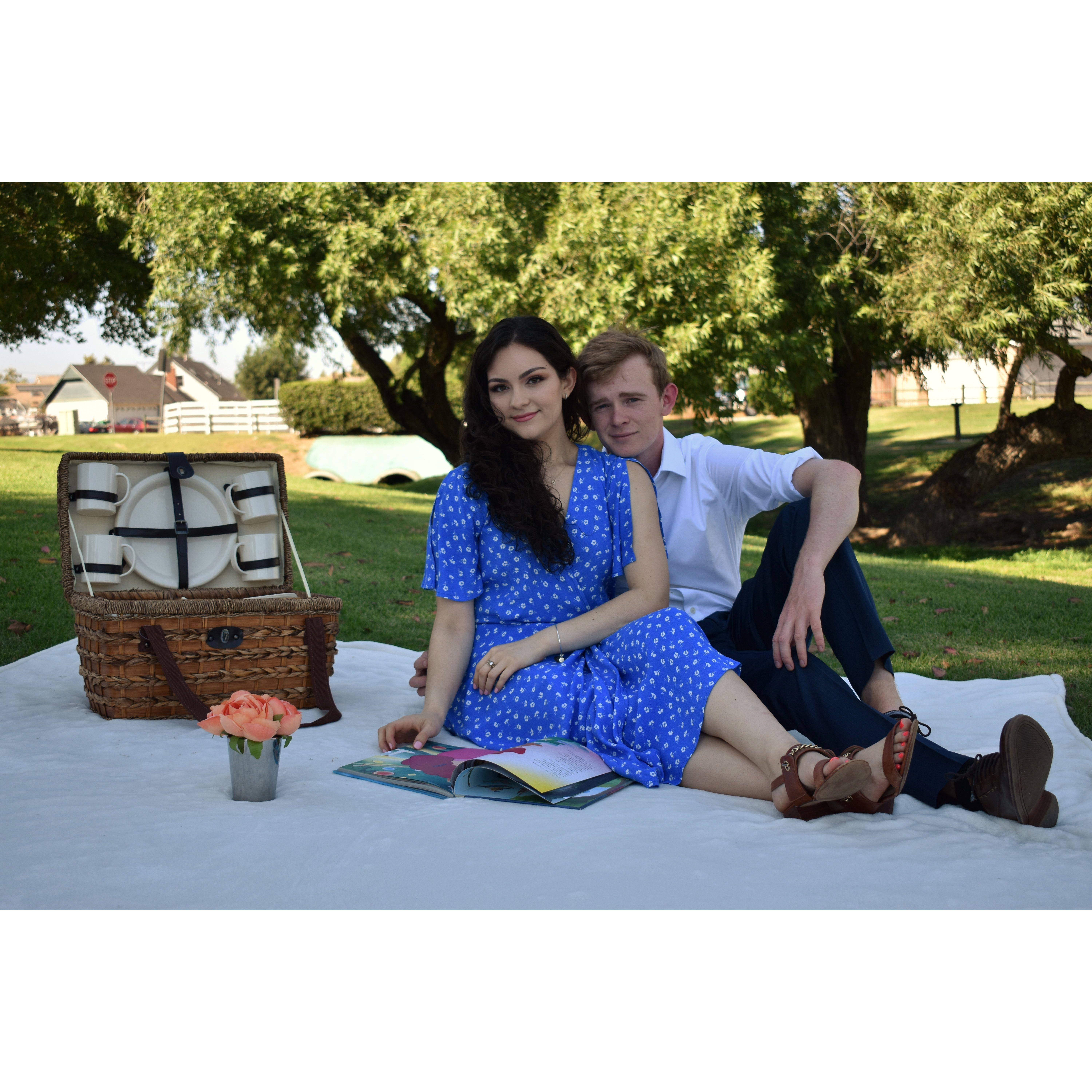 The book opened on the blanket is "Lady and the Tramp." Nolan has always compared Victoria and himself to the story.