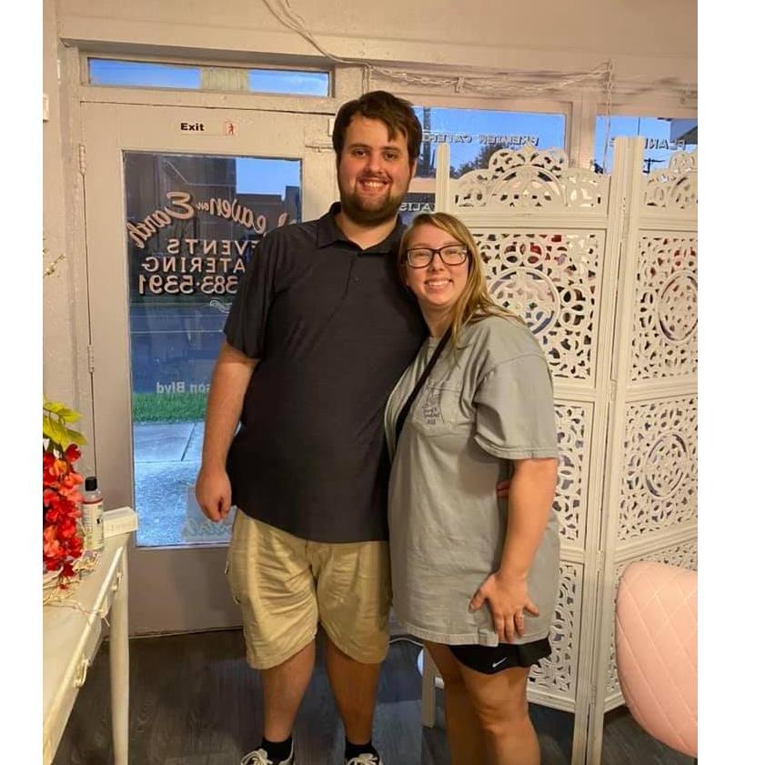 This is us after tasting the AMAZING food that will be served at the wedding!