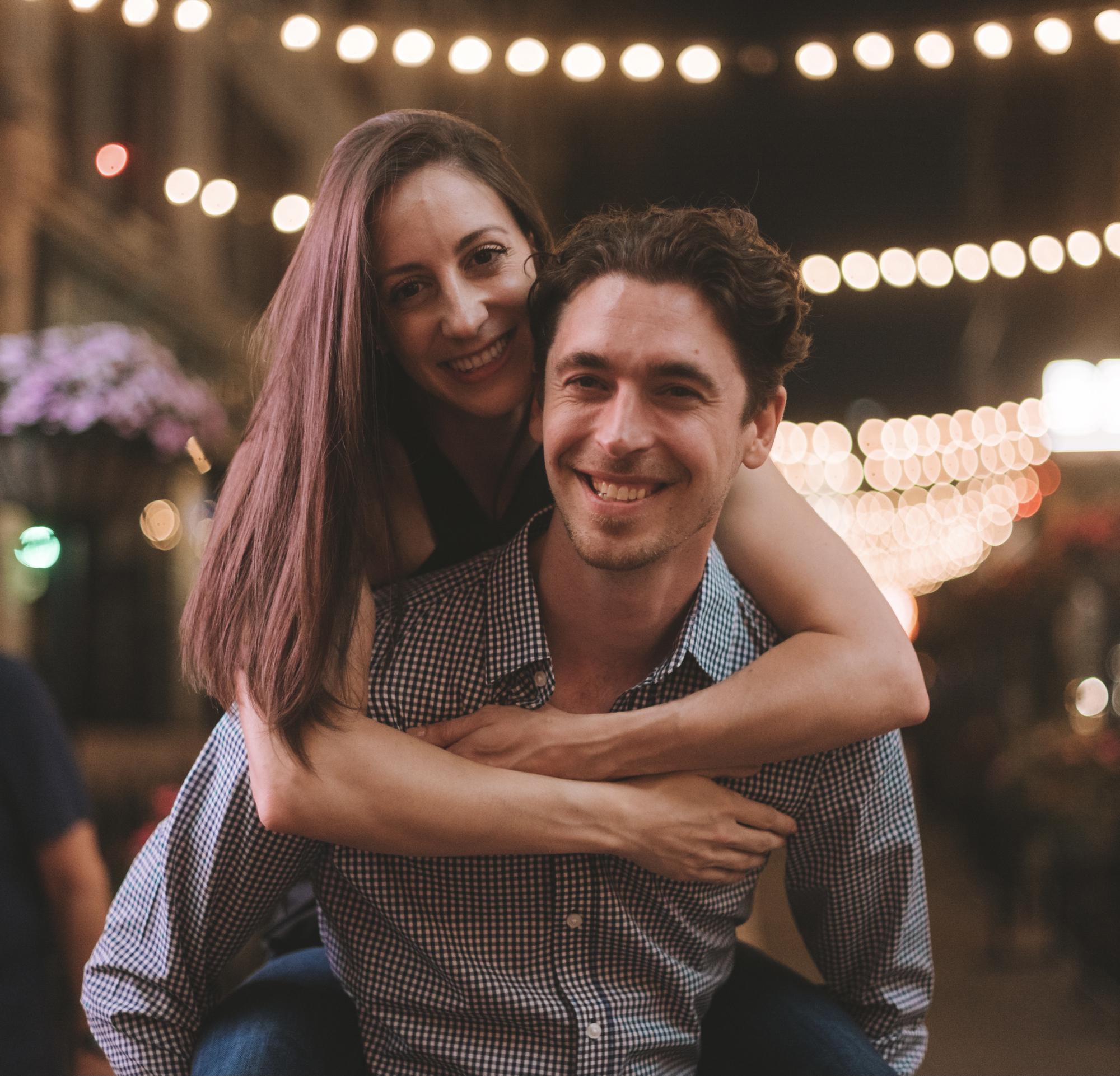 Engagement photo shoot on E. 4th street in downtown Cleveland at night; July 2021