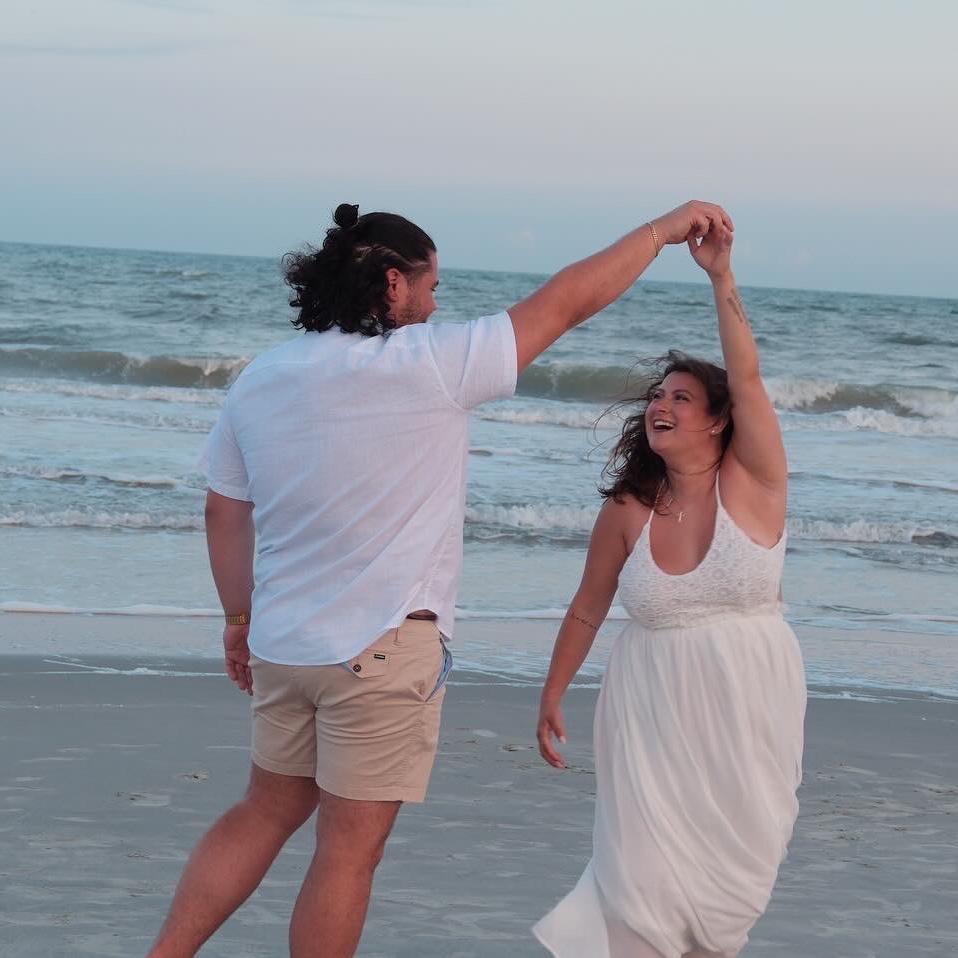 Our engagement photos in one of our favorite places, Pawley's Island, SC.