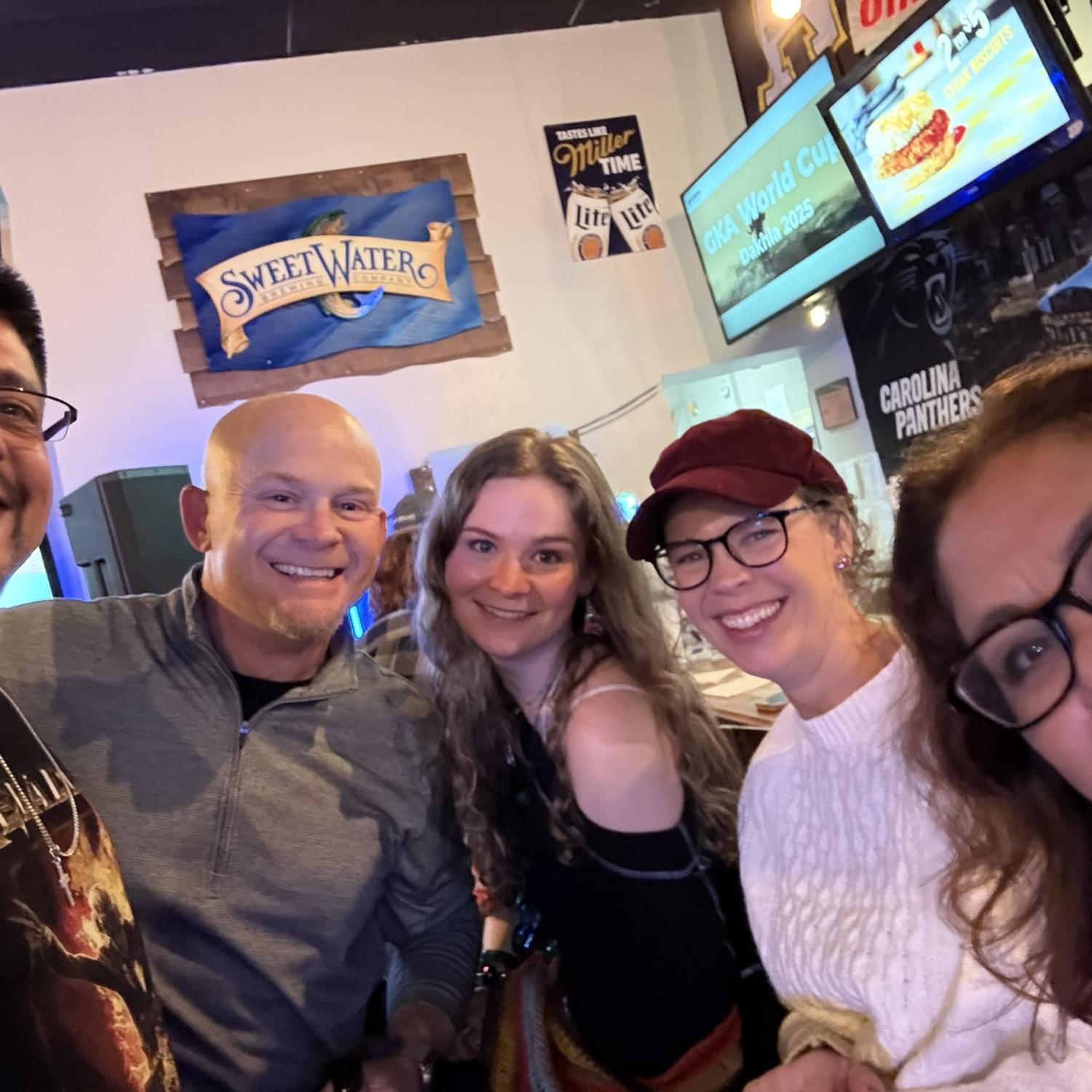 Our families get along very well! Here’s a picture with Alexa & the parents at one of Leo’s gigs. He plays bass guitar in a couple bands.