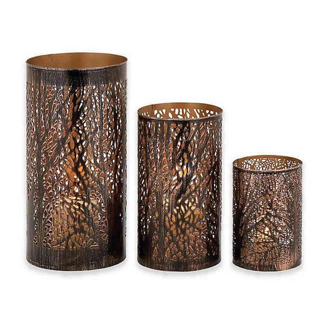 Ridge Road Décor Pierced Forest 3-Piece Iron Hurricane Candle Holder Set in Bronze