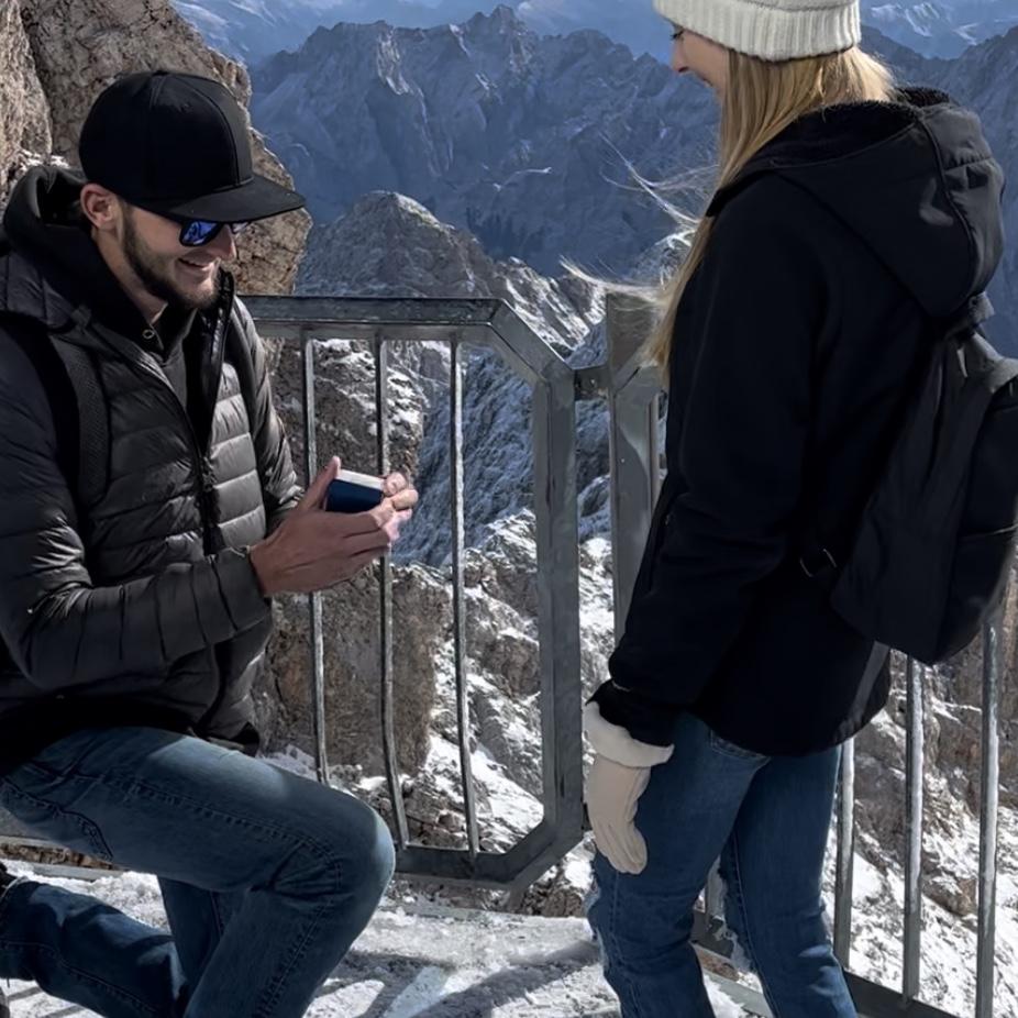 Getting engaged at the top of the highest peak in Germany!