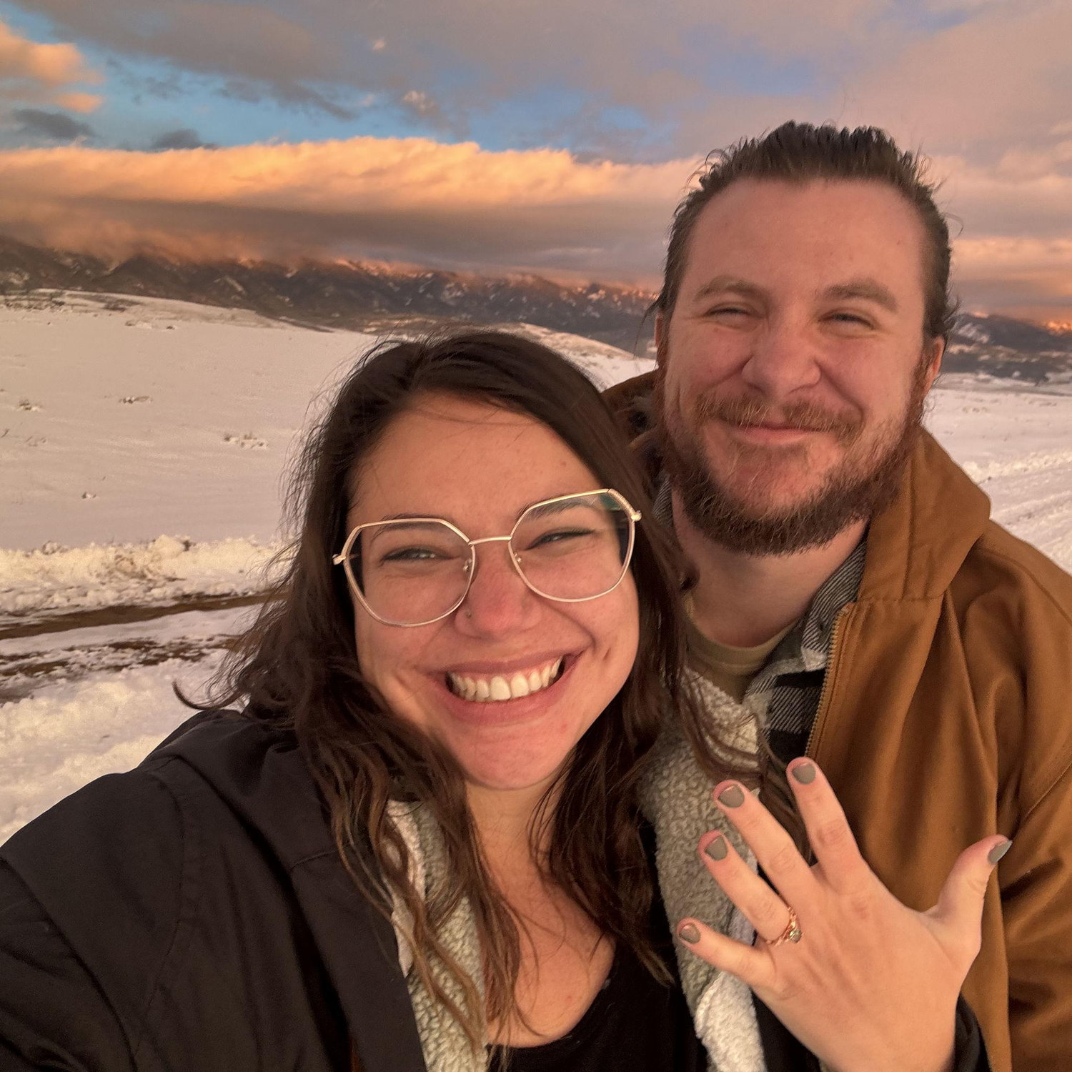 Celebrating our engagement at sunset in Walden, CO.