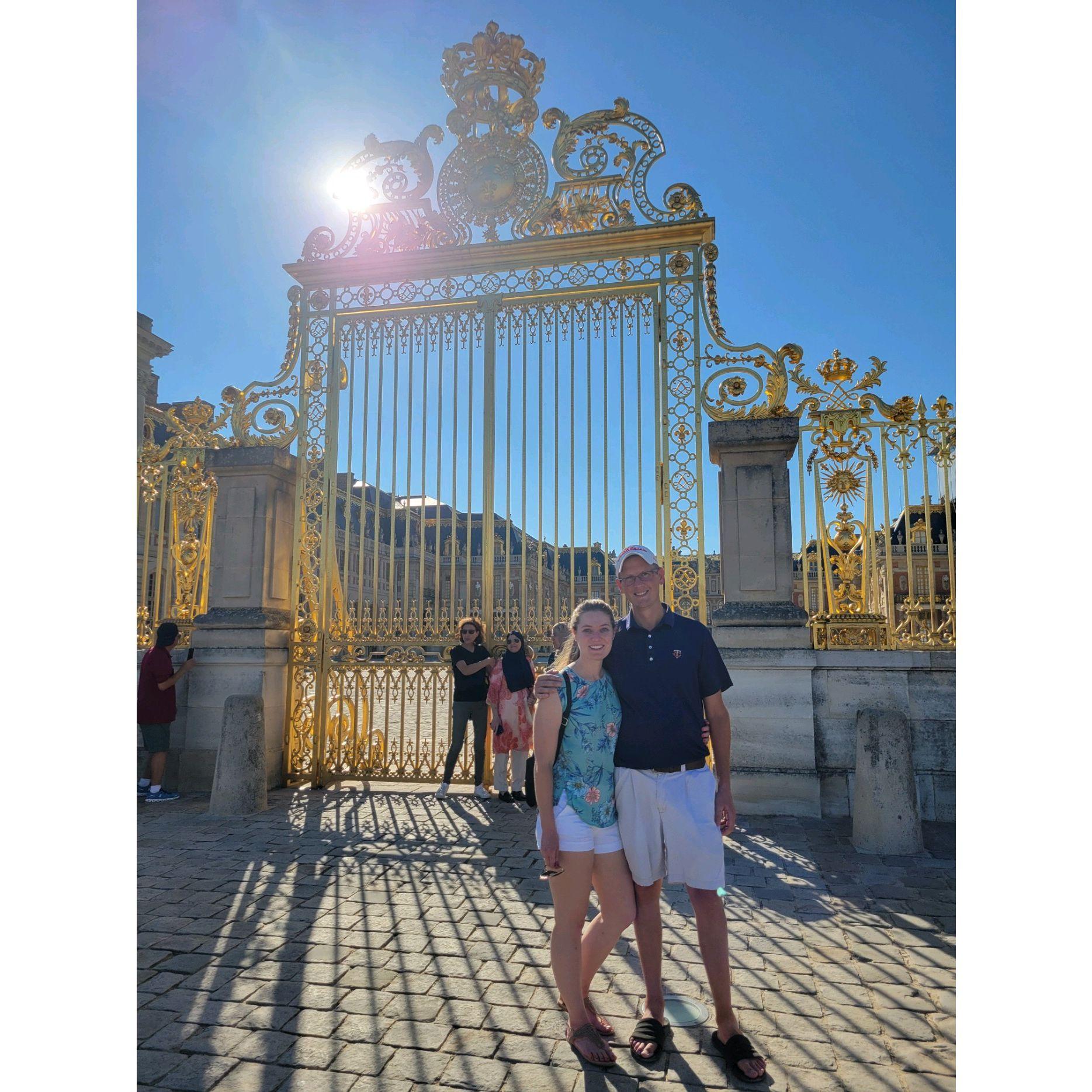 July 2022 outside the gates of the Palace of Versailles.