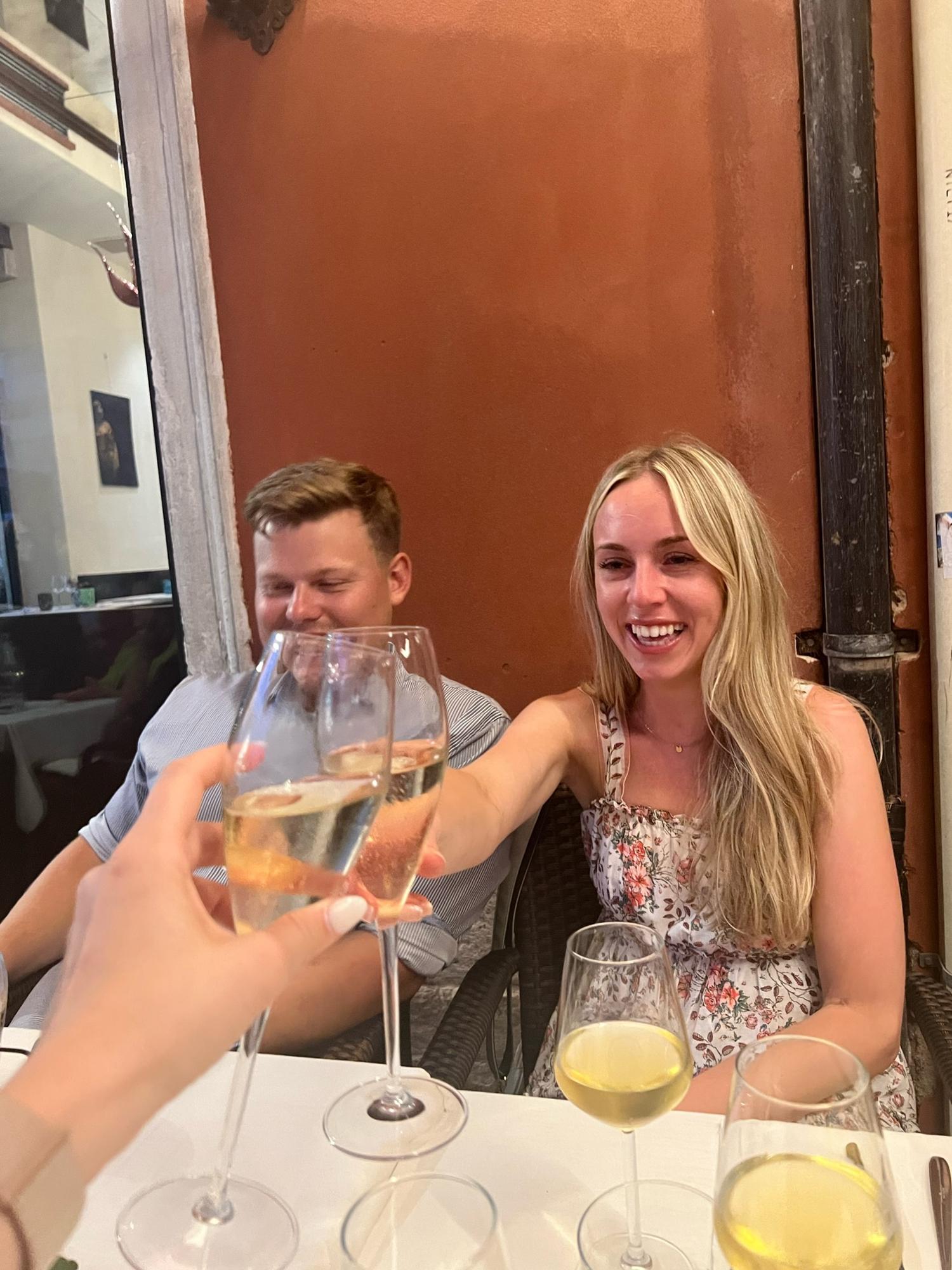Celebrating at dinner after the proposal