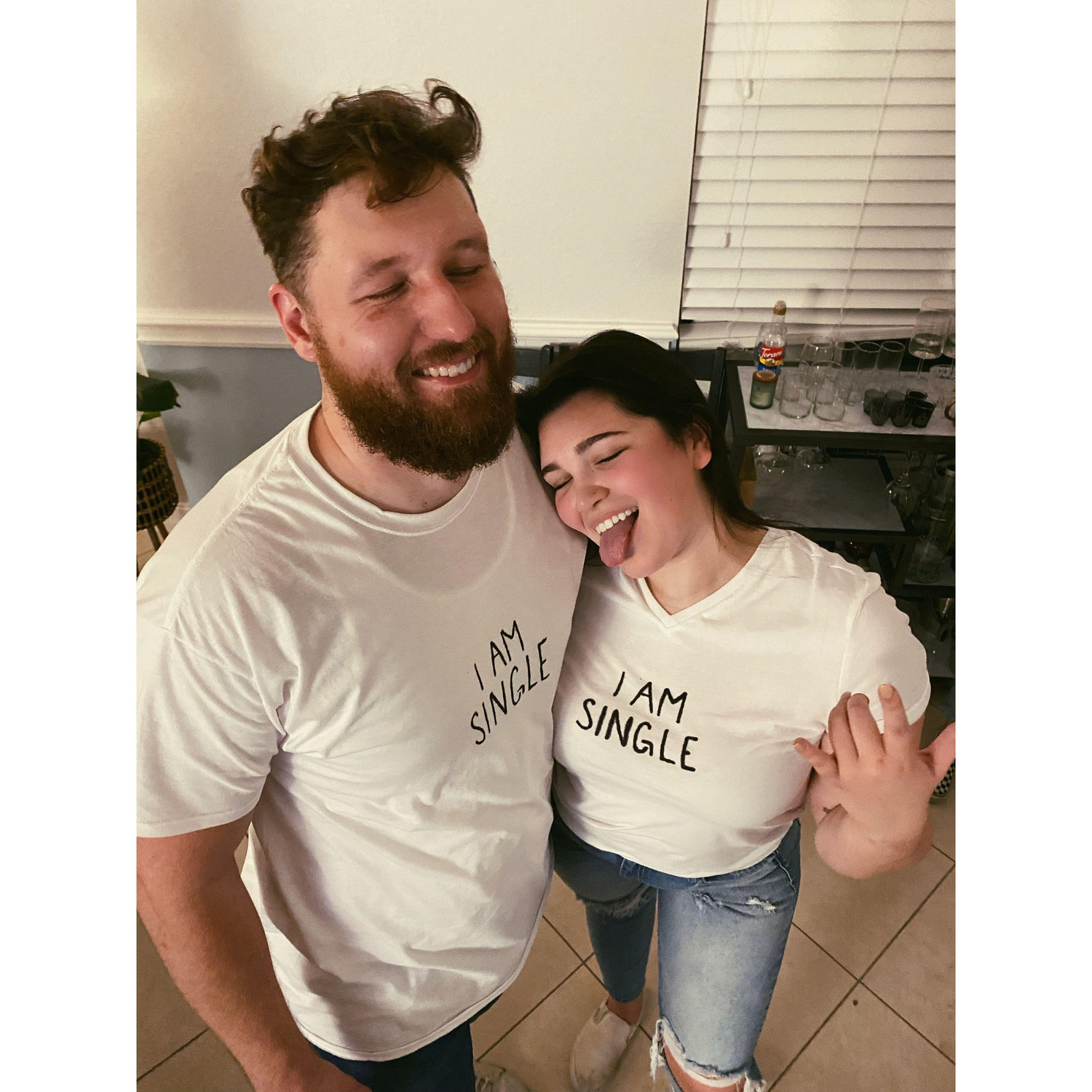 Our very first photo together at a "white lies" T- shirt party; we were in fact, not single!