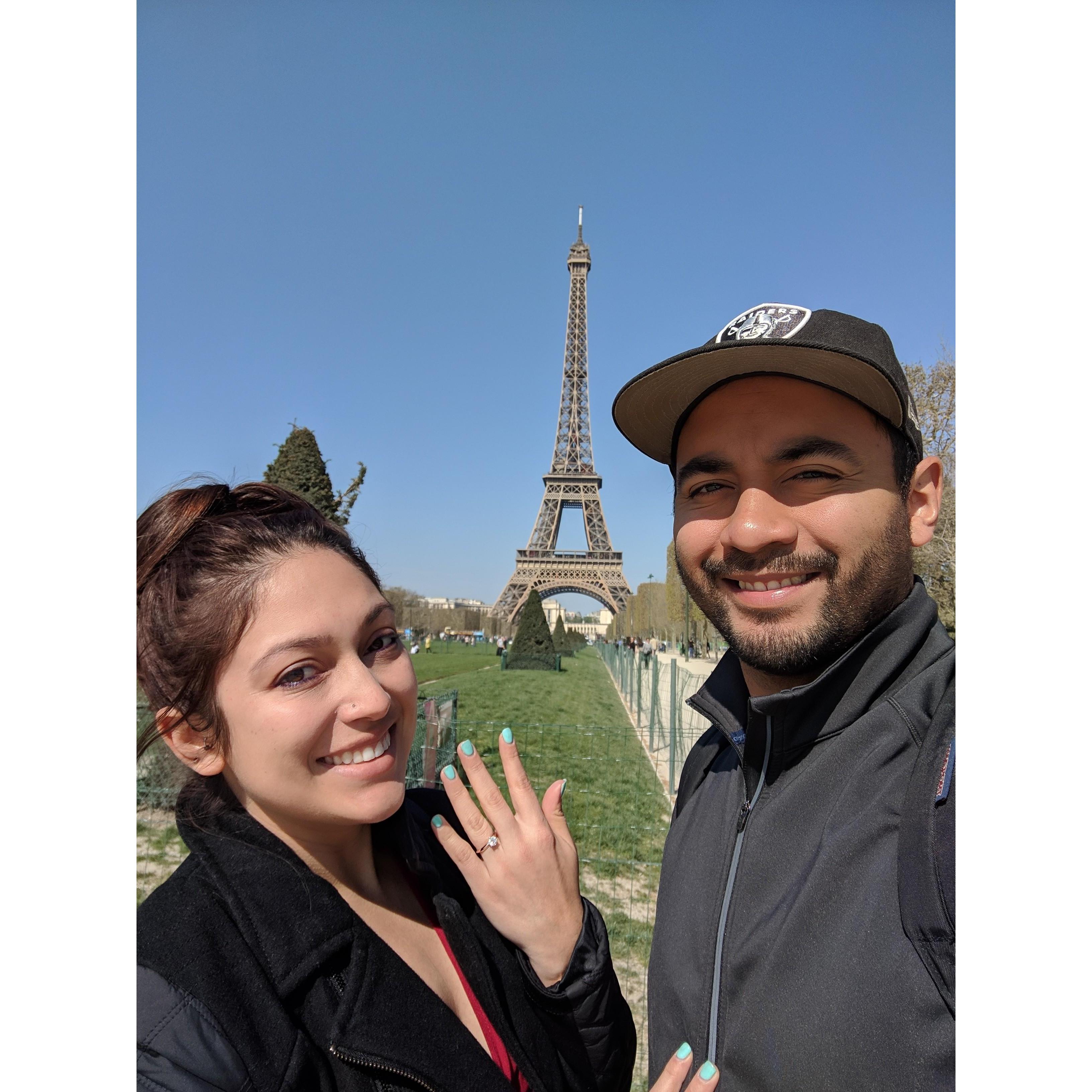 After Timmy proposed, Tati was so nervous that all the pictures they took that night came out blurry. They had to visit the Iron Lady again to snap a clear "She said 'Yes!'" shot.