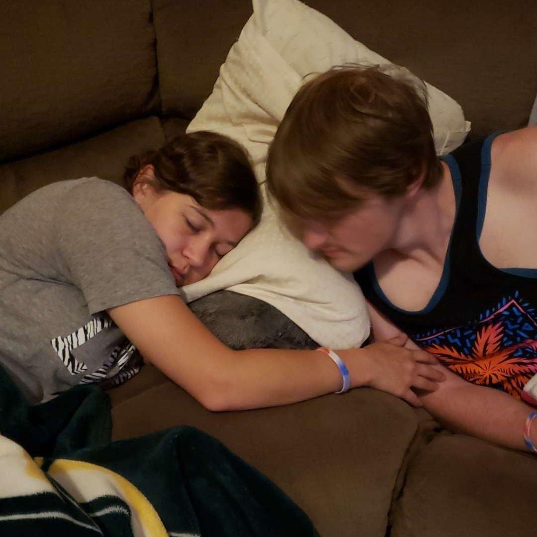 Asleep holding hands