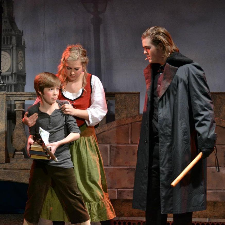 First photo of us together! We were in the play Oliver our sophomore year. We still were not friends in this picture, but we were married in the play!
