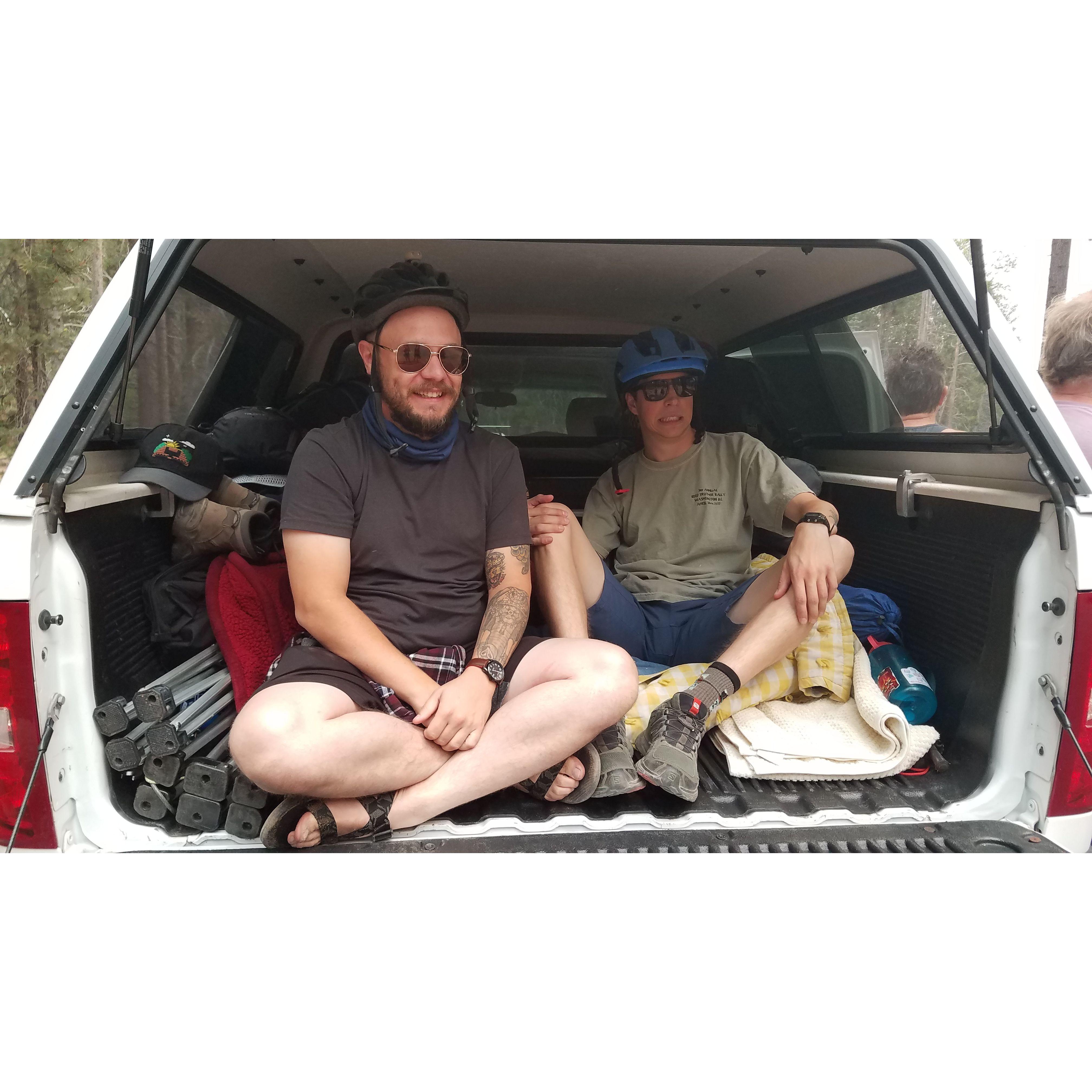 The car broke down. We tried to have the boys travel safely in the back of the truck.