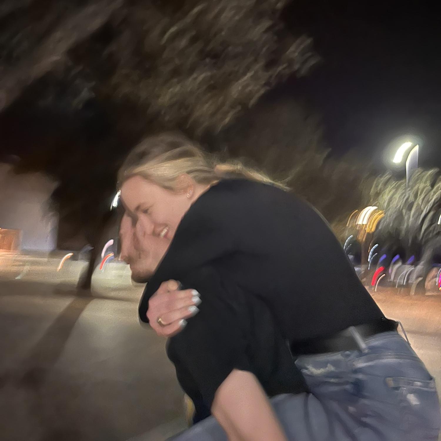 They weren't dating yet, but Lewis carried Lindsey halfway across campus because she decided not to wear sensible footwear that night. This is Lindsey's favorite picture.