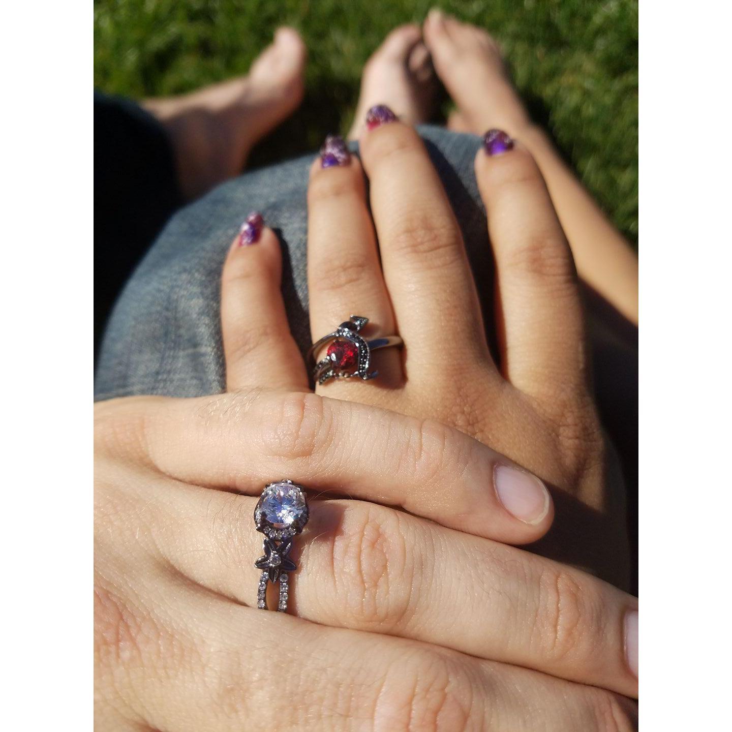 Sitting barefoot in the grass at Stanford admiring our new engagement rings