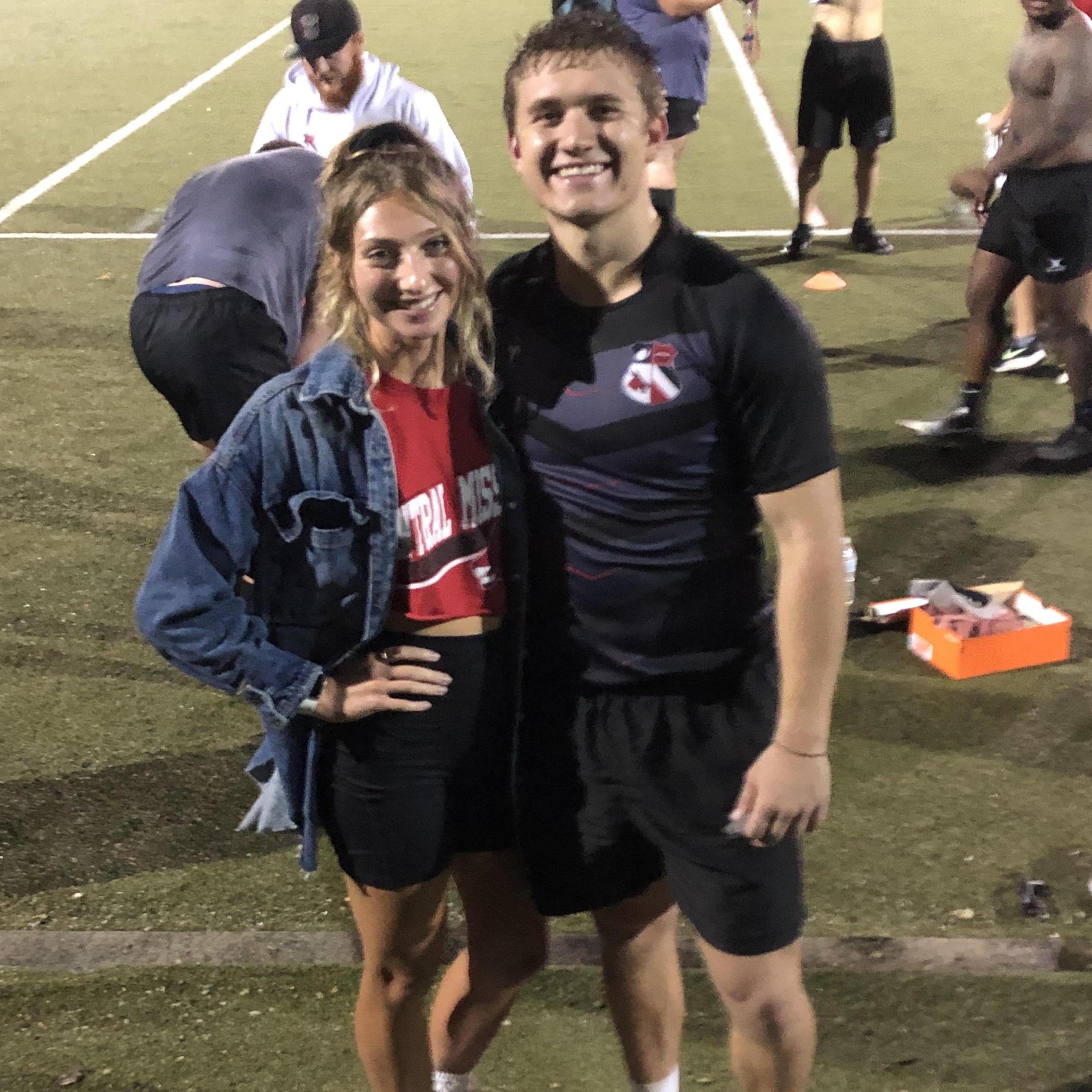 Aly supporting Aaron at one of his rugby games