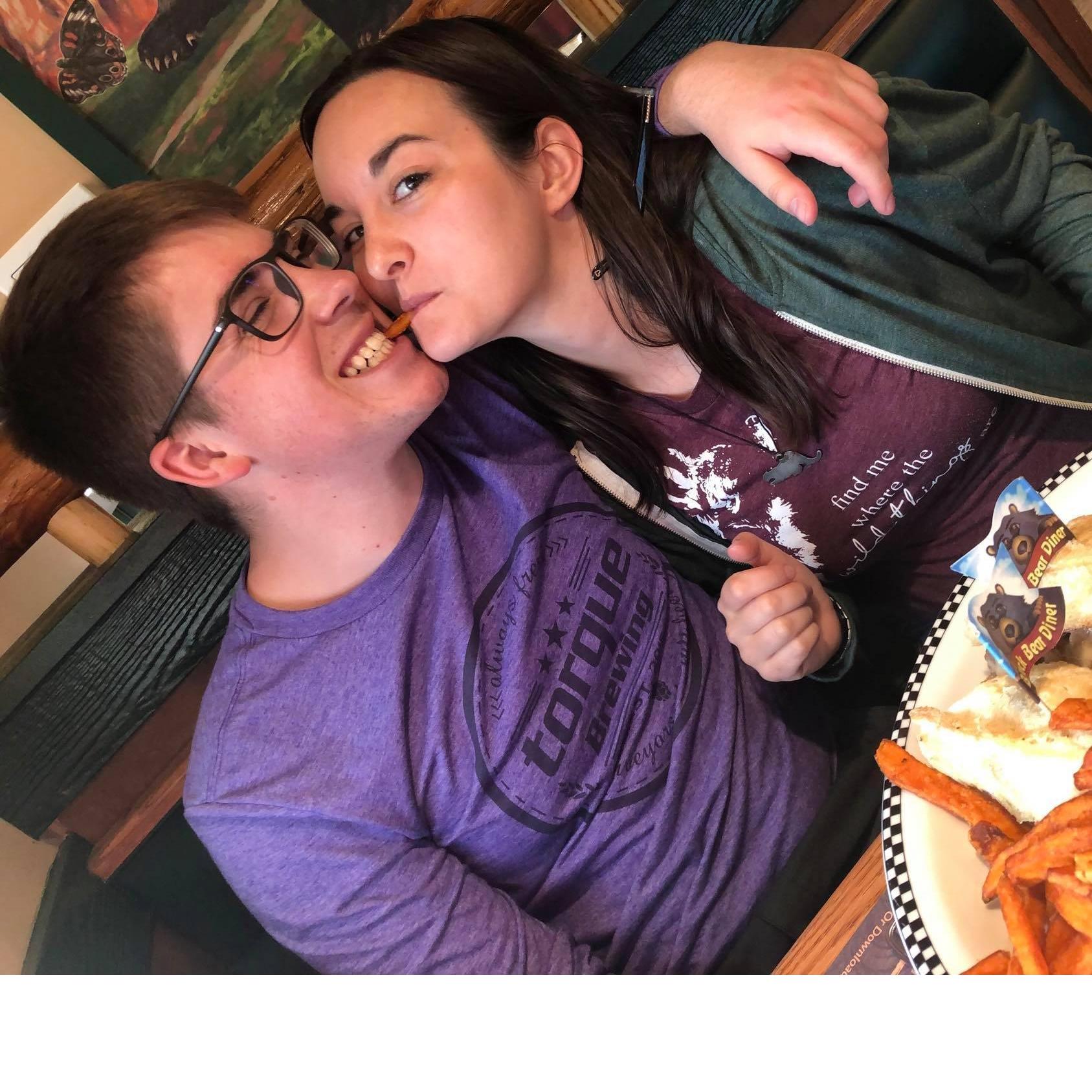 Meghan and Austin share everything - even French fries while out for dinner!