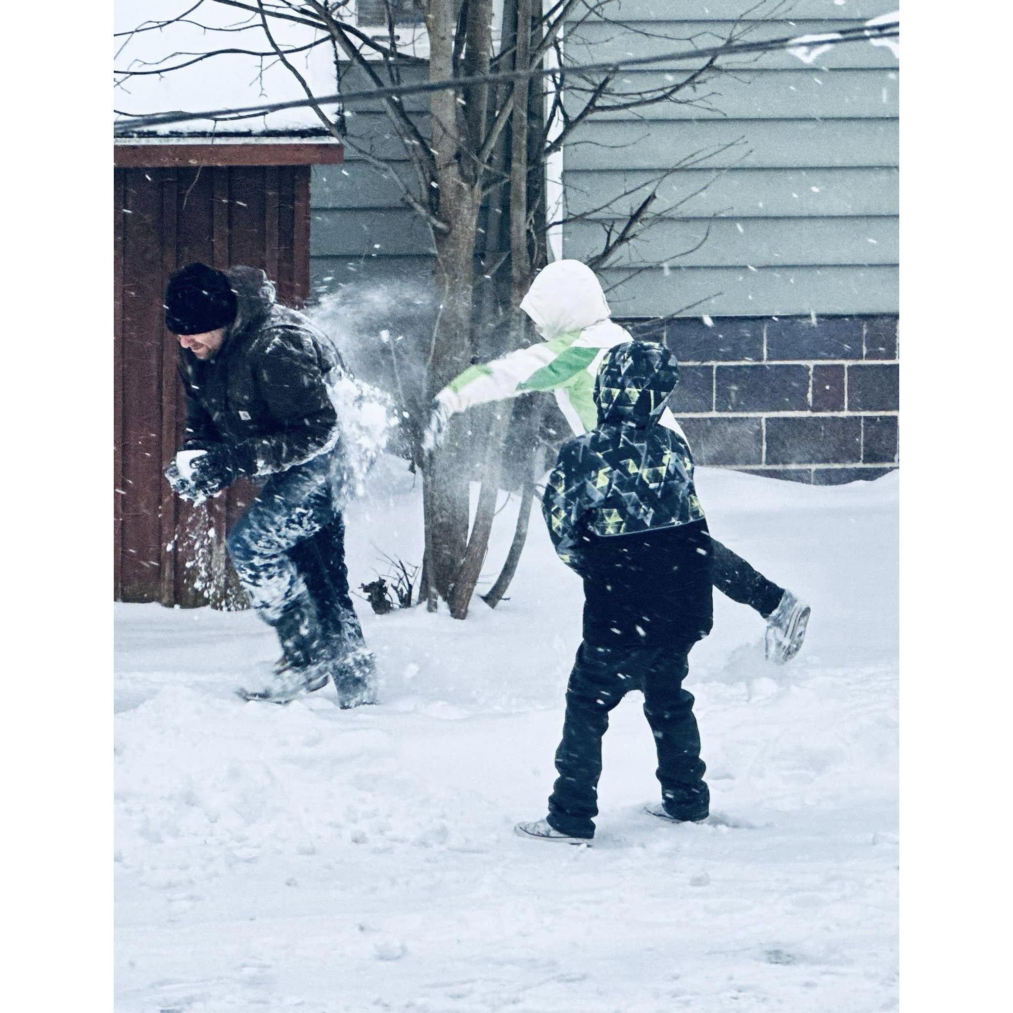 Evan not only experienced his first airplane ride (it was Corbin's 2nd), but they both experienced their first REAL snowball fight.