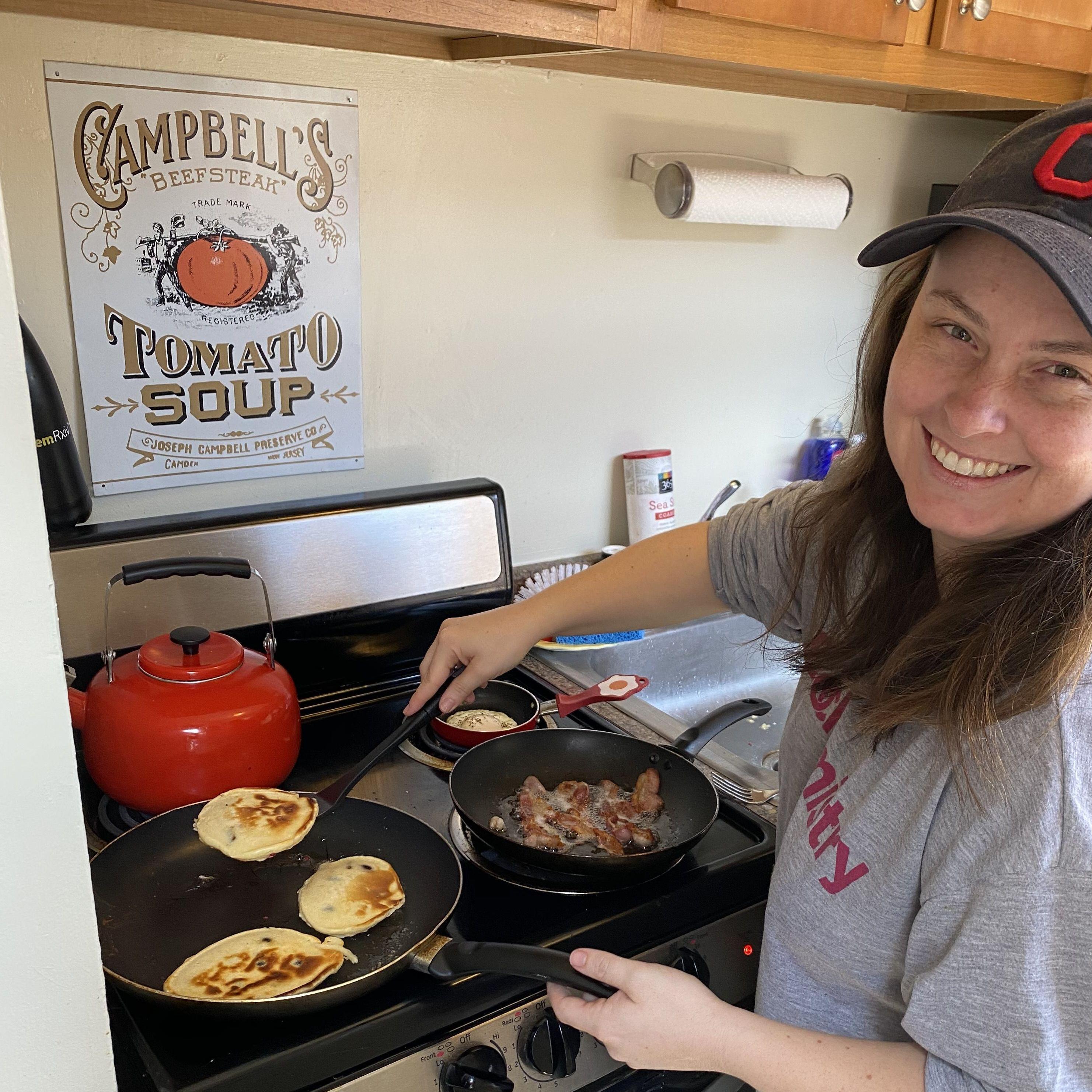 Rachel making pancakes after moving into Molly's apartment in April 2020