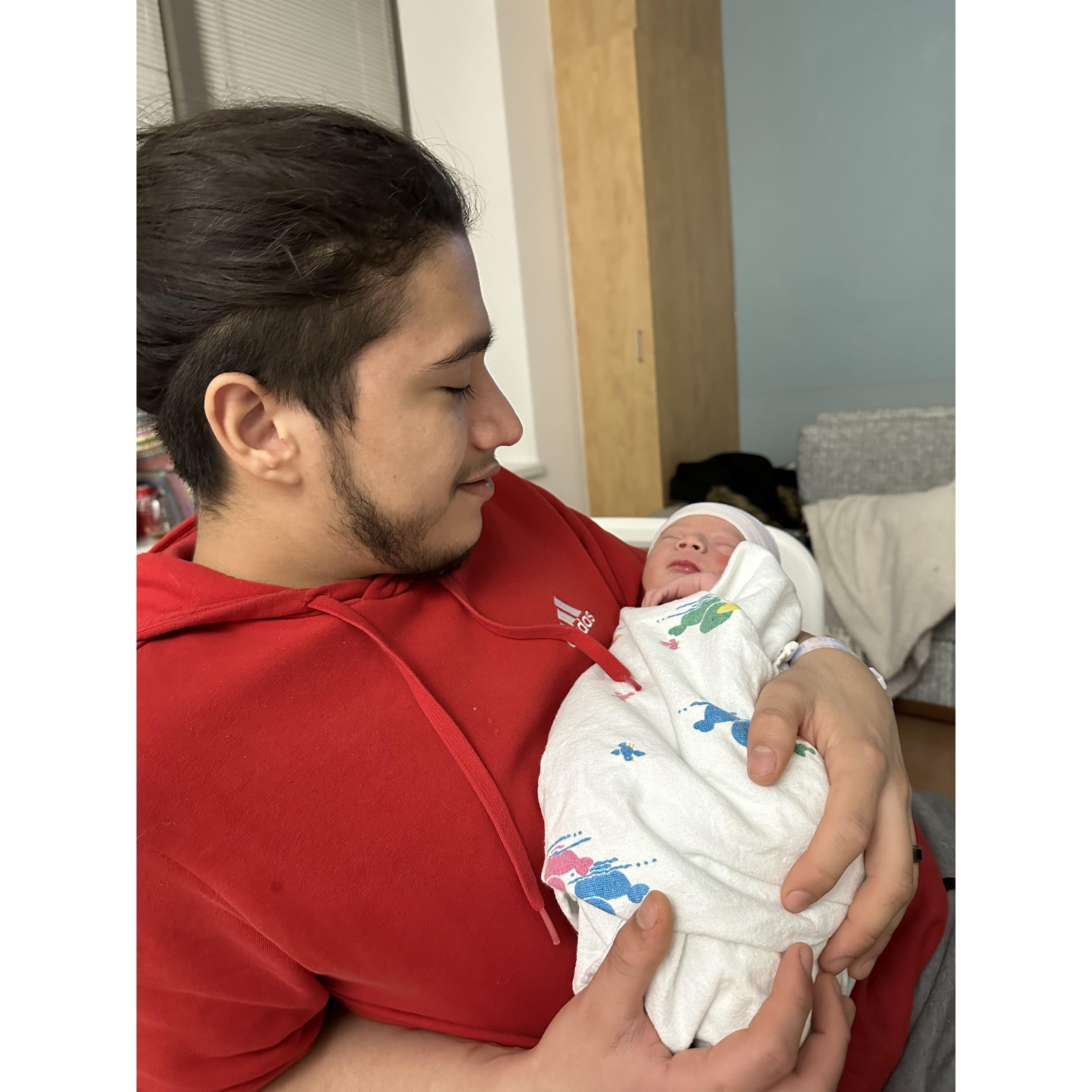Fernando holding baby Leo