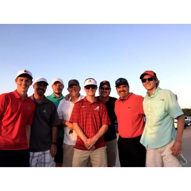 Adam, Zach, Garret and Mitchell playing golf with our dads!