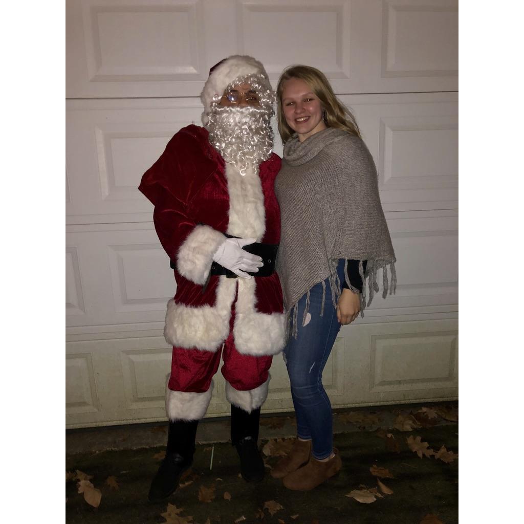 Kayke had to dress up as Santa for a group of little kids in 2018!