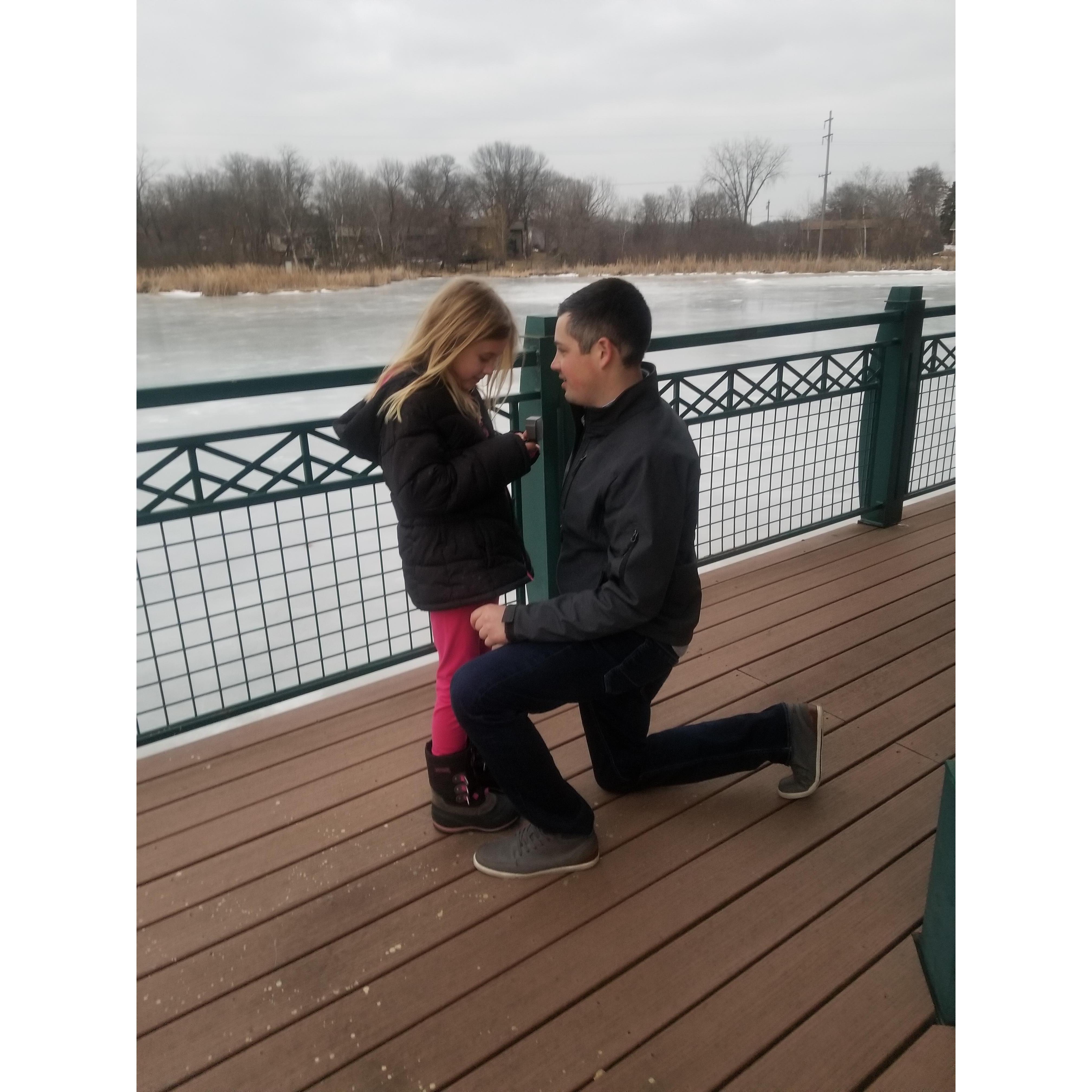 Joe getting down on one knee to ask if he can be her bonus Dad