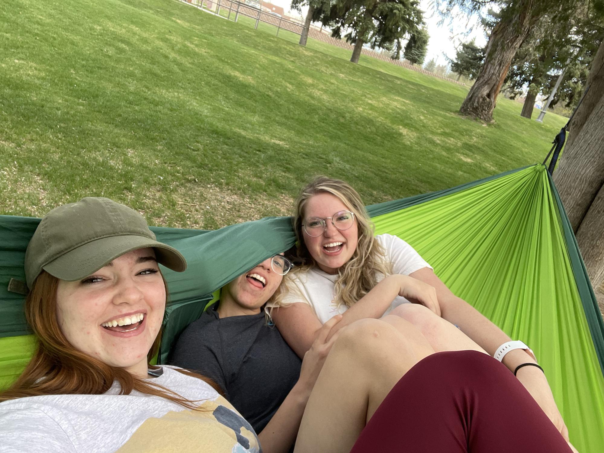 April 2021:
This is a photo of JJ and Ashley (and of course their friend Elise) at the start of Spring 2022, the semester they became inseparable.