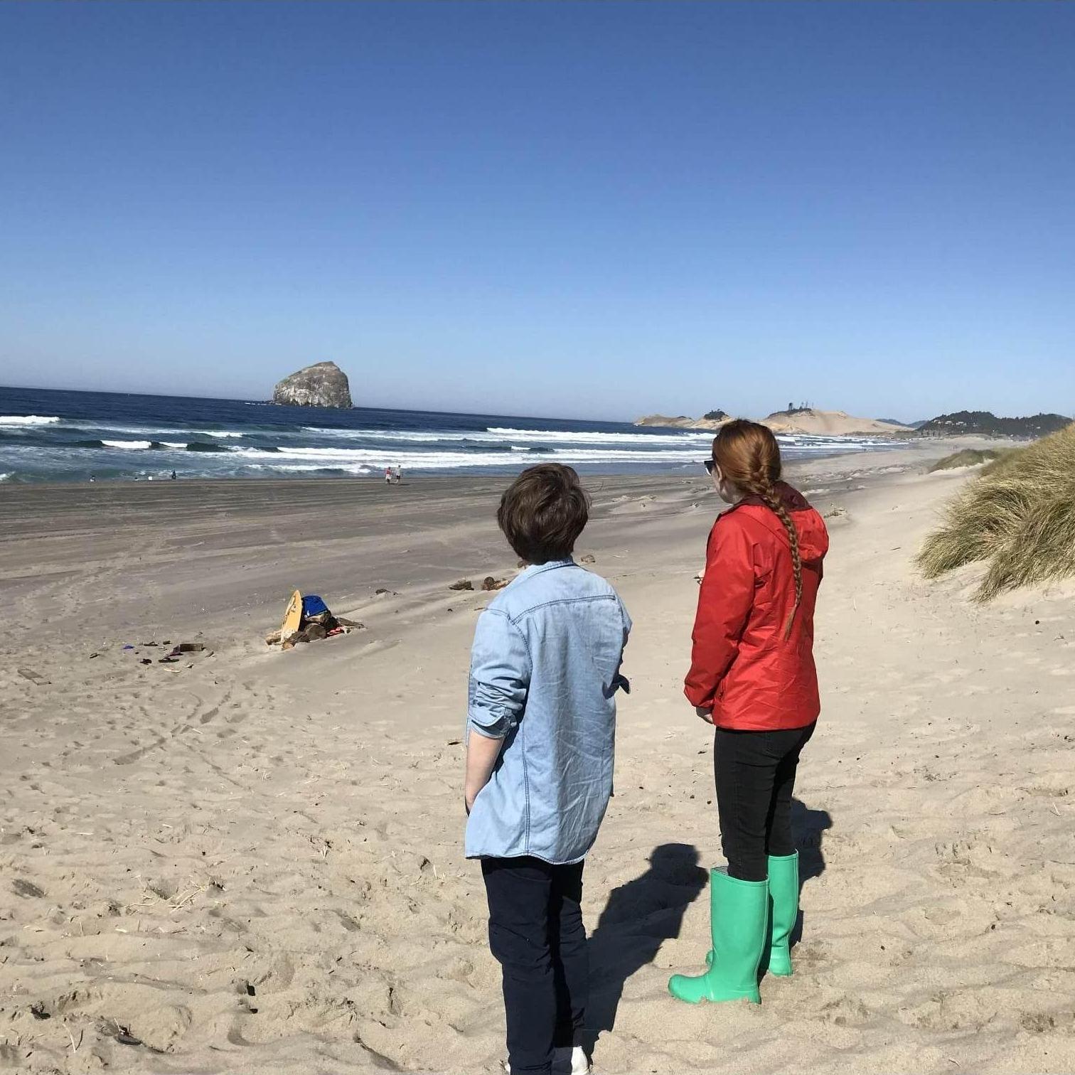 2018 - A visit from Julia's dad prompted a trip to the beach. It was much warmer than Hannah was expecting that day!