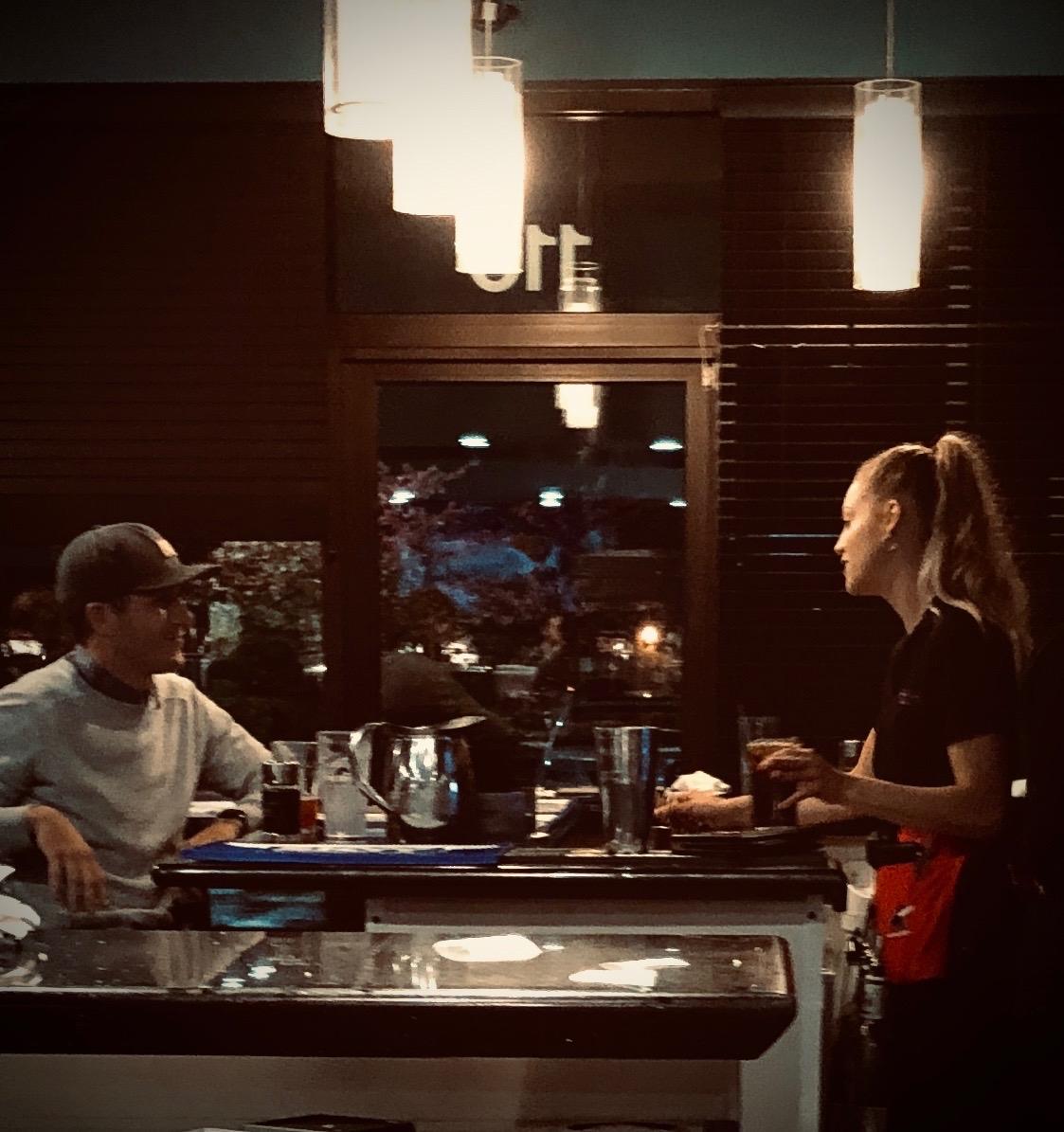 A sneaky photo Katie’s sister Riley had made sure was taken of when Austin came to visit with Katie for the first time at Trappers Sushi. Kinda creepy... but a fun photo to have now!