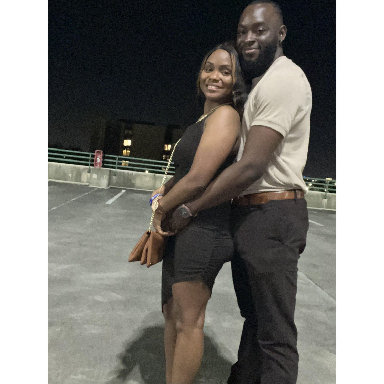 This is after our first date! I wanted to take a picture with her so bad that we went to the top of a parking garage at USF and took this picture on my phone. This is our first picture!