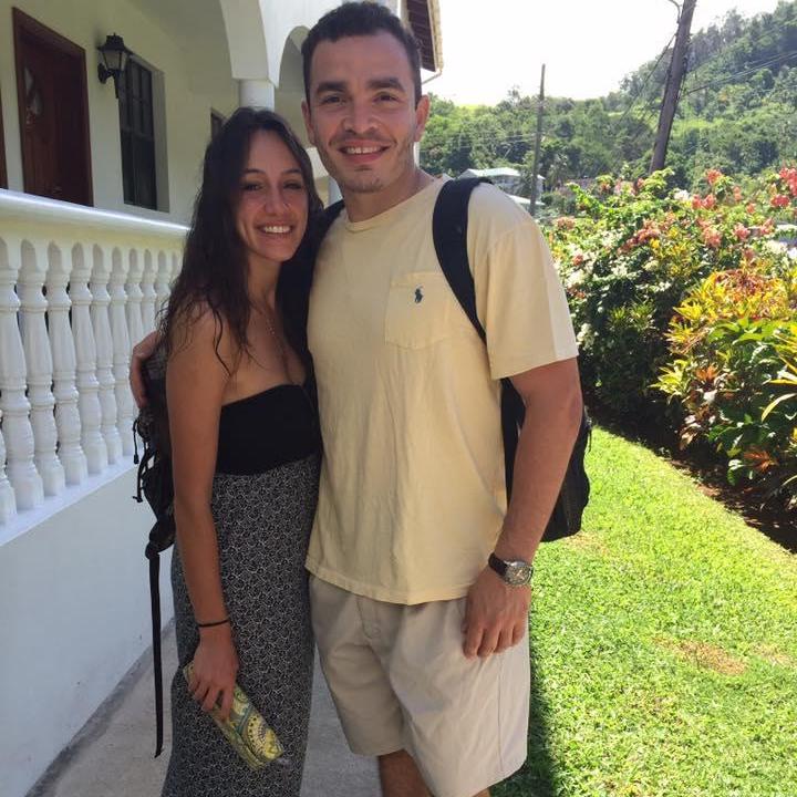 Last picture we ever took in Dominica in front of our apartment building (and the place we first met)