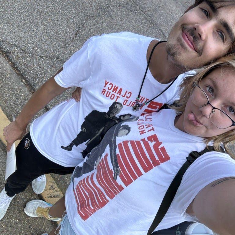 Matching shirts from our favorite artist! (Our first dance song is in this album!)