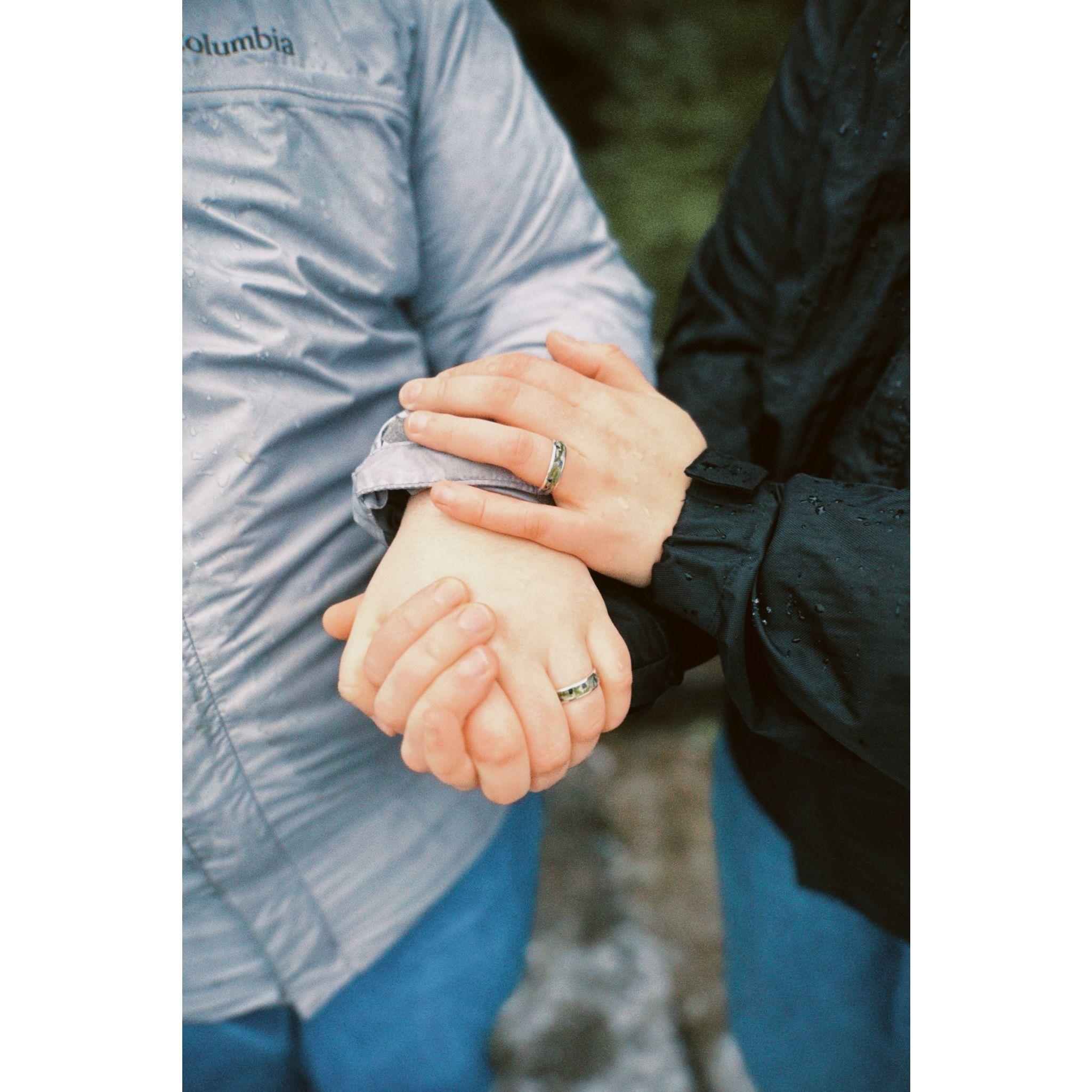 Ty designed our wedding rings, handmade with pieces of moss from our background and mussel shells from the beach.