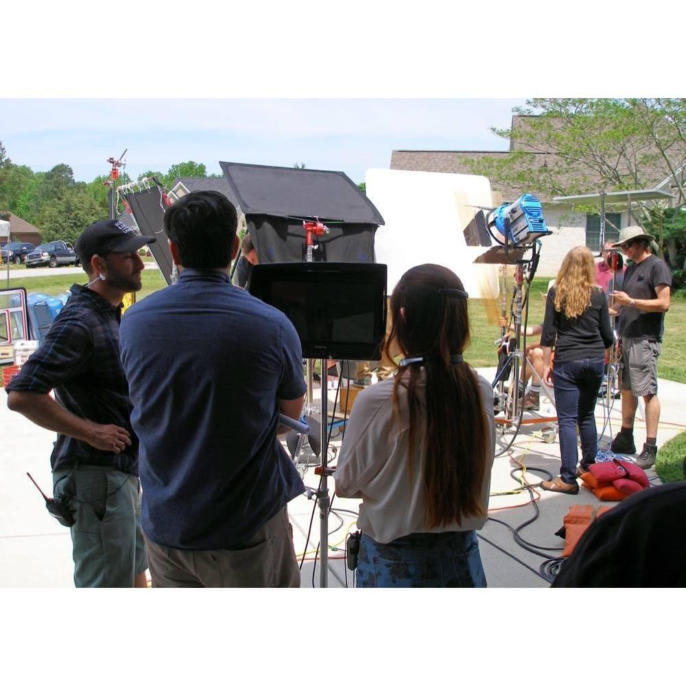 Kaitie and Brian working on set together, co-directing.