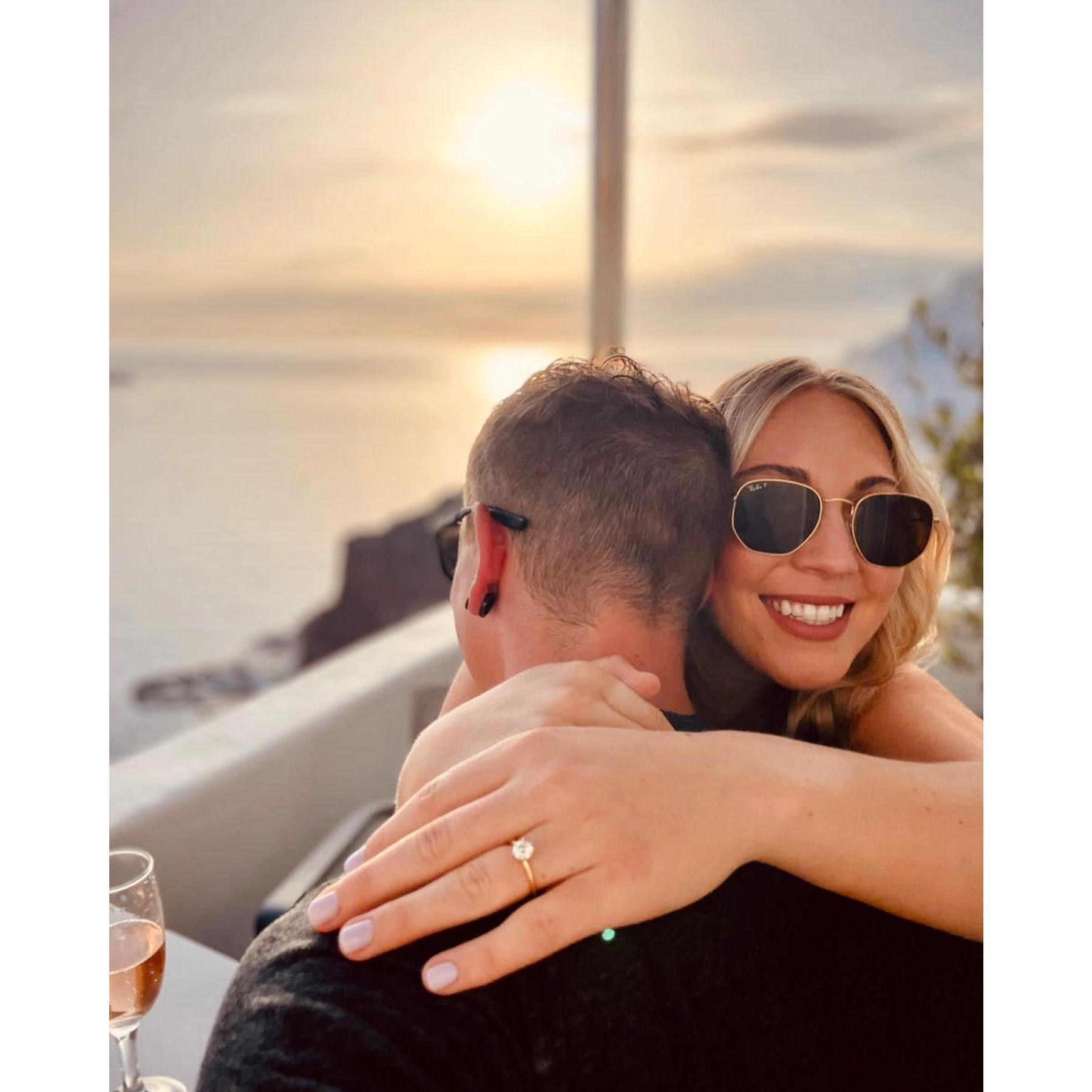 Moments after getting engaged at sunset 2022 – Santorini, Greece