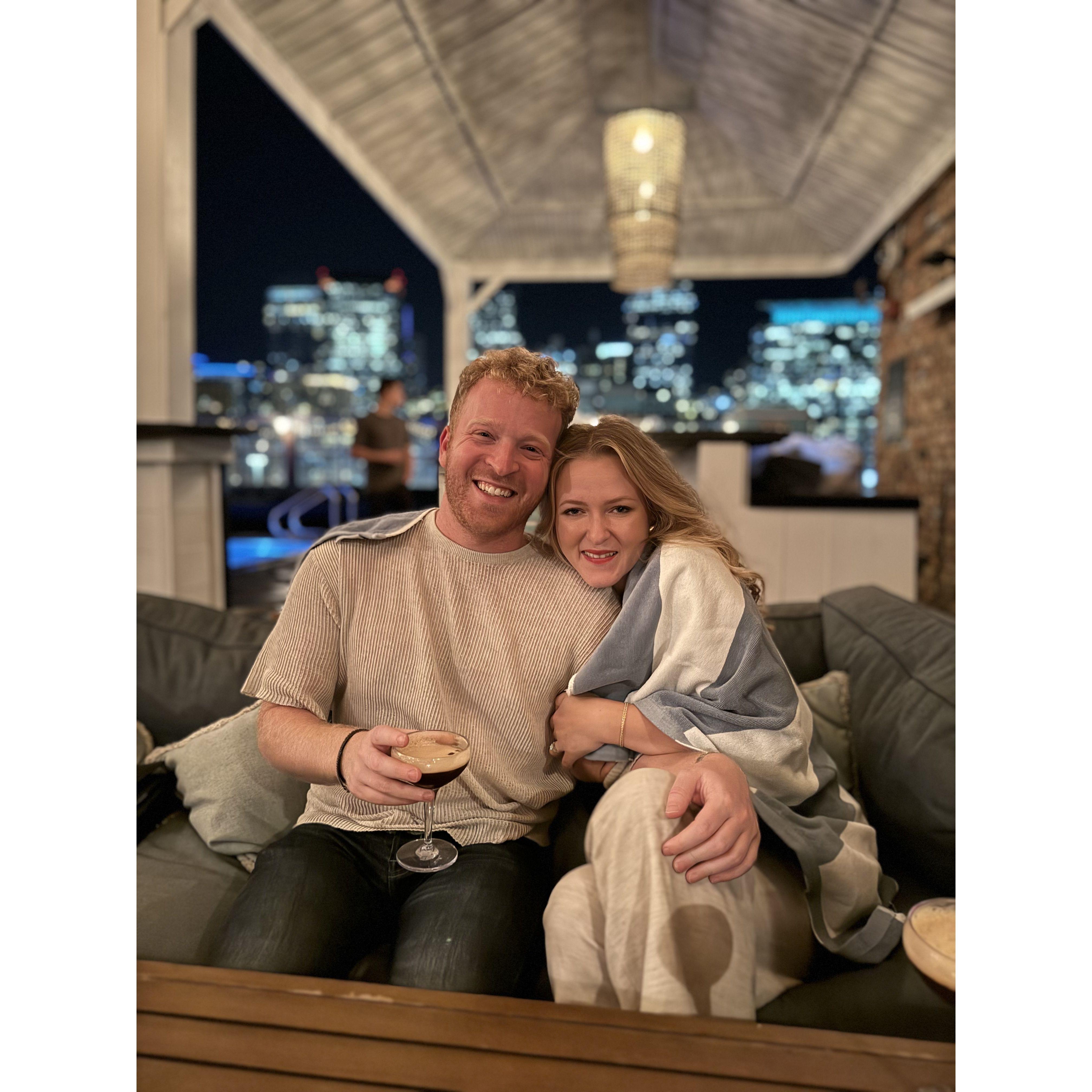 Cuddling at the SoHo House rooftop while enjoying an espresso martini