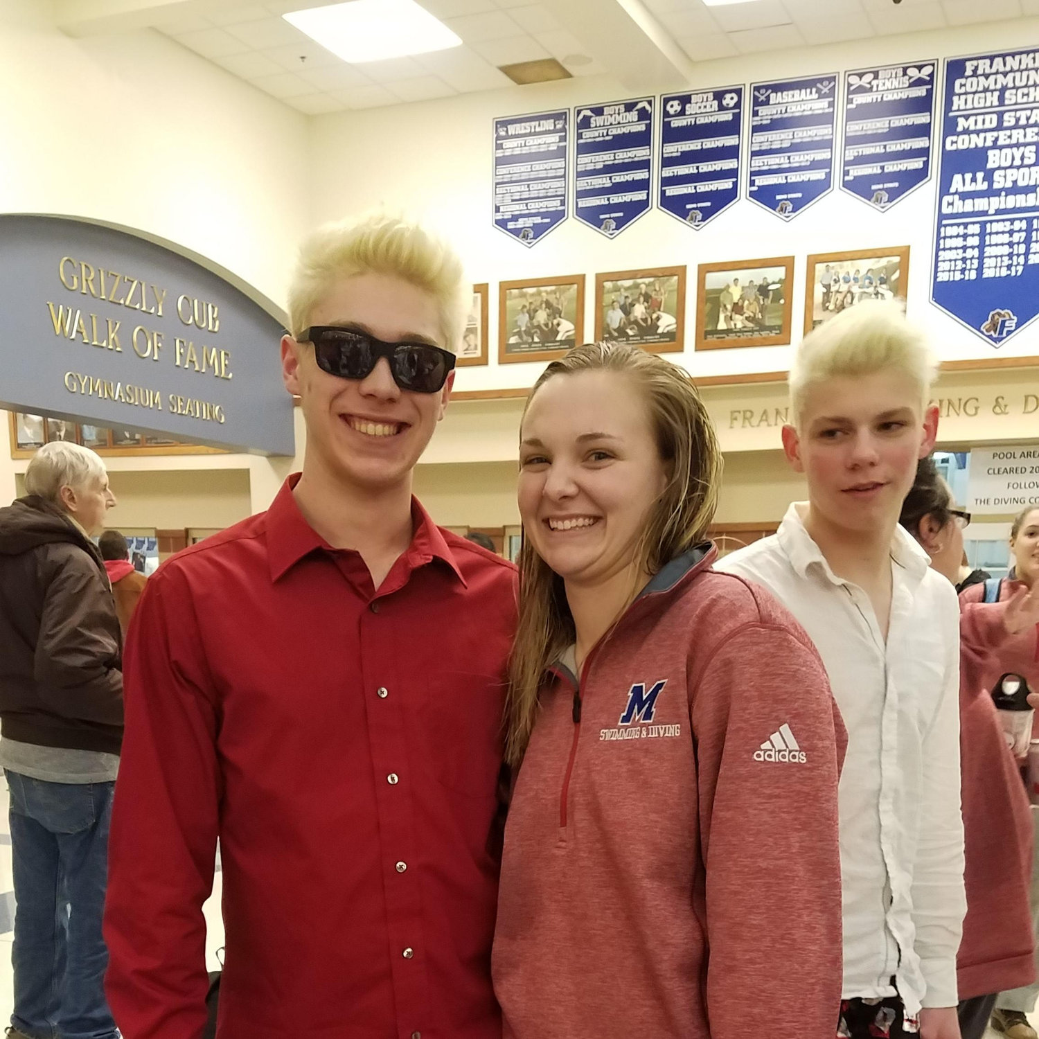 Miles in Risky Business attire supporting Ally in the girls swimming sectionals