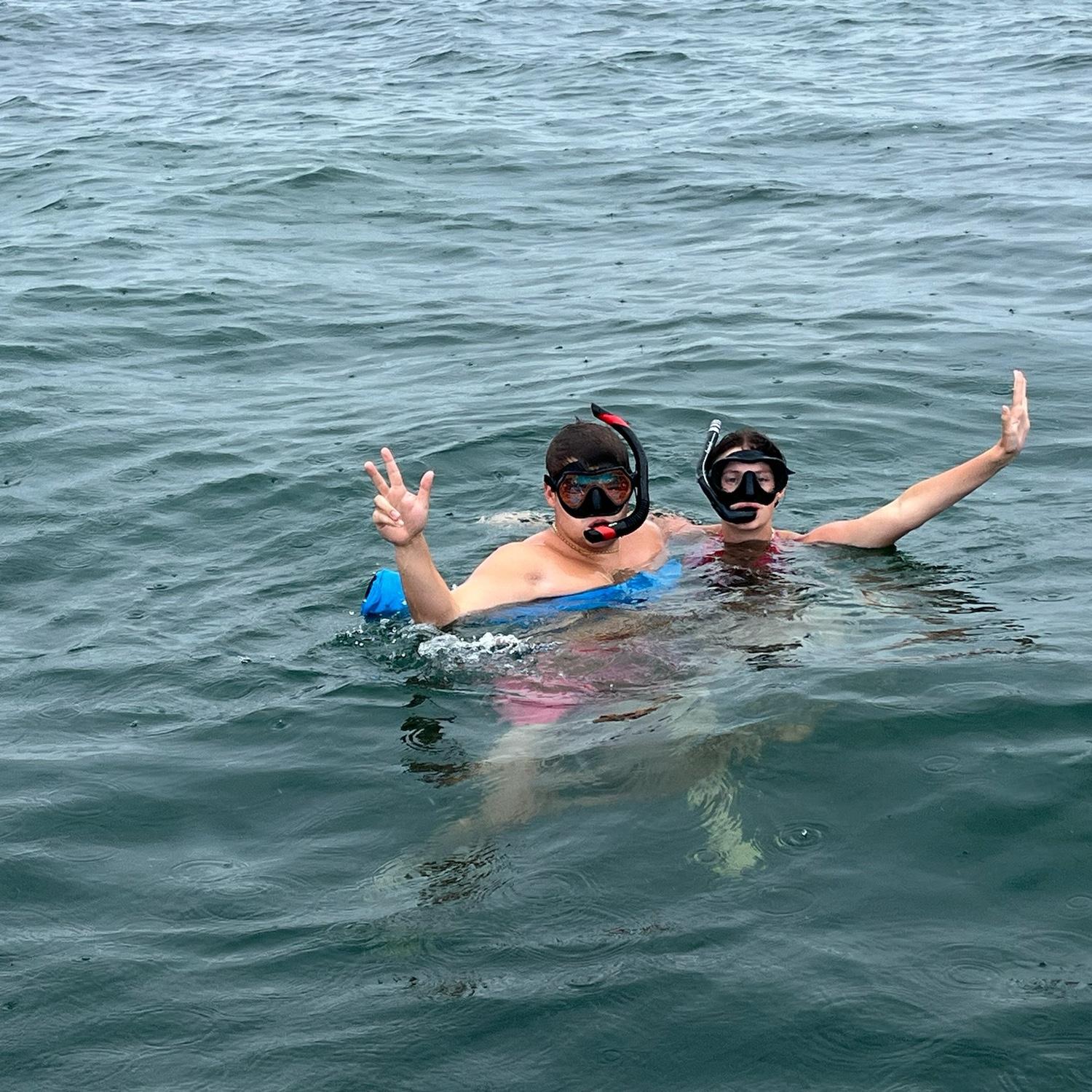 Lucas’s first time snorkeling! A rough and rainy day didn’t make for great visibility.